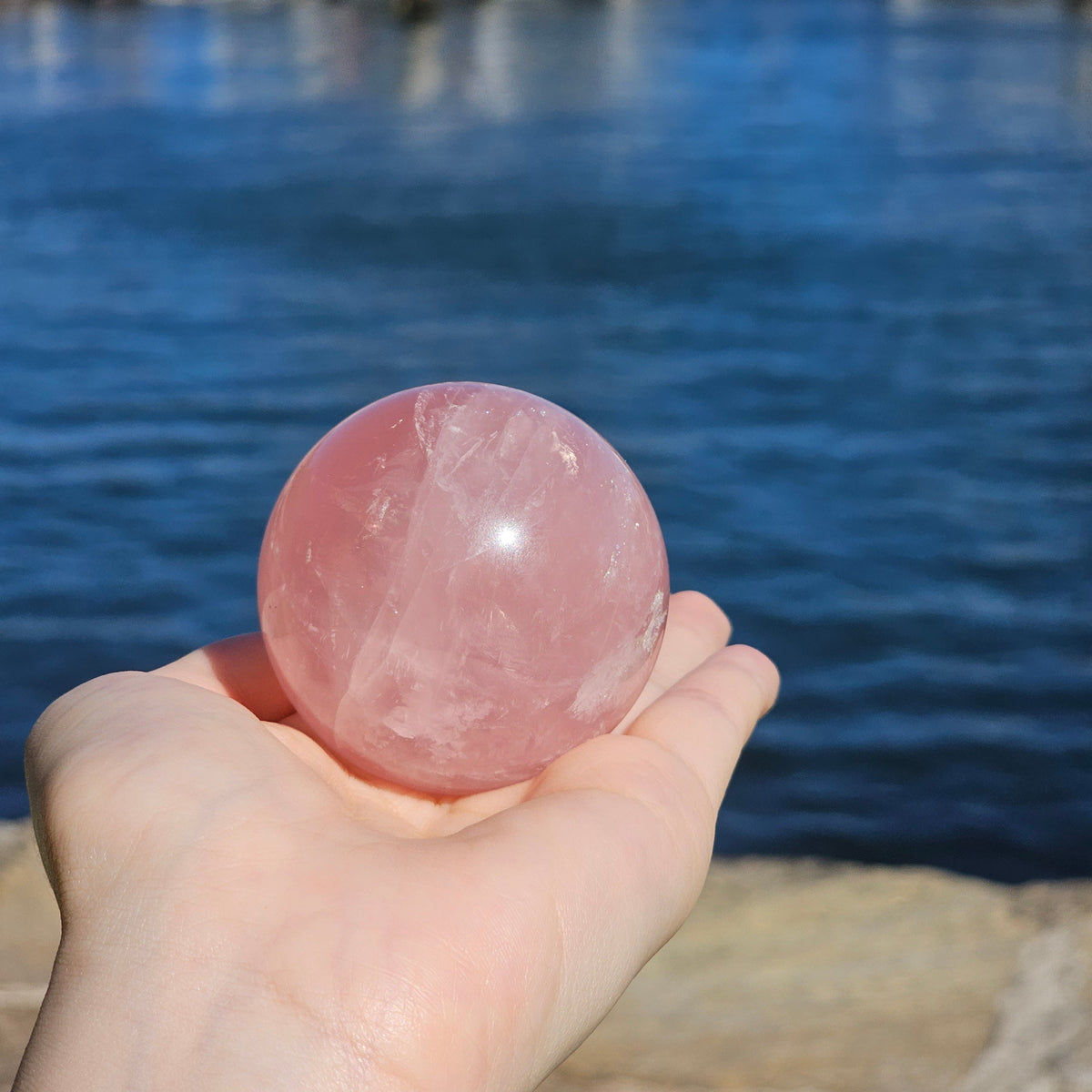 Rose quartz crystal sphere