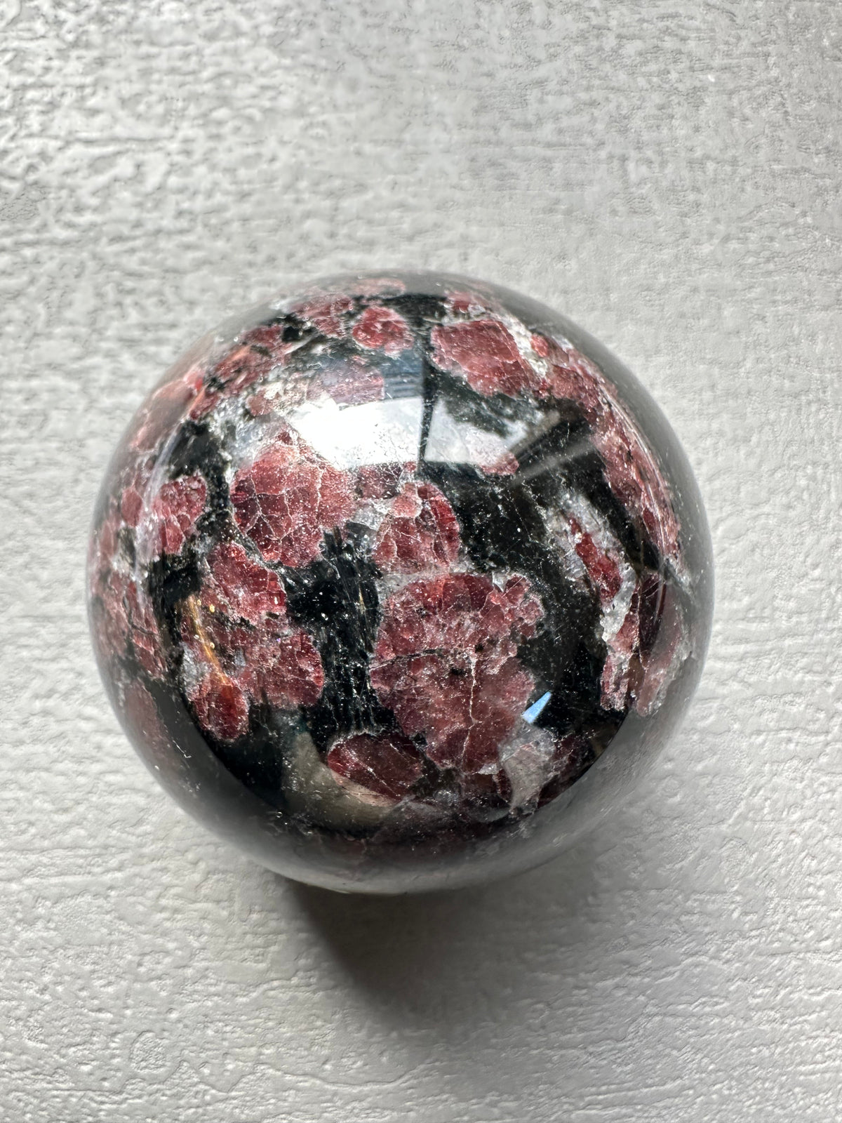 Natural garnet sphere for zodiac and birthstone gifts collection