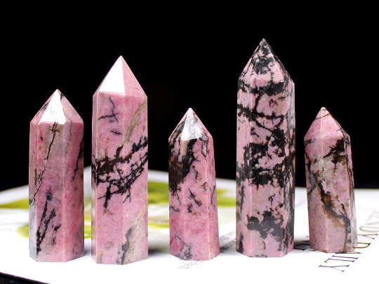 Natural pink Rhodonite crystal tower