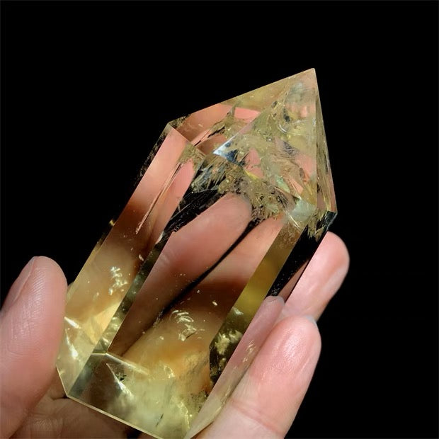 Citrine tower side view showing polished facets and quartz inclusions