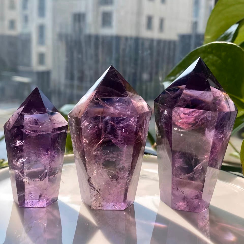 Natural Uruguay Amethyst crystal point showing violet zoning
