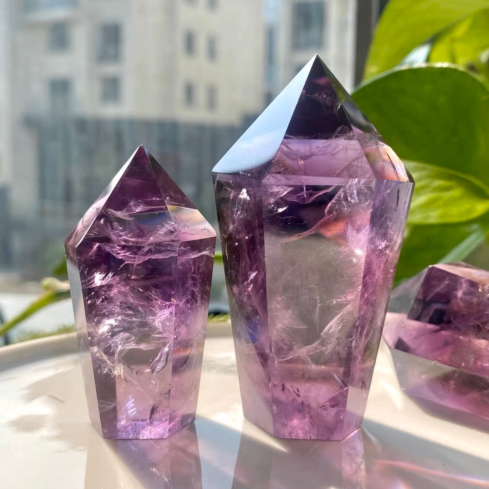 Polished Uruguay Amethyst tower displayed in natural light