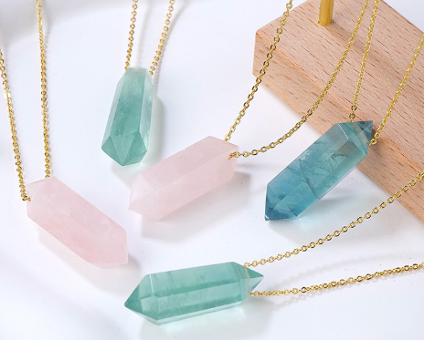 Crystal drop necklace with gold-plated chain and natural stone pendant