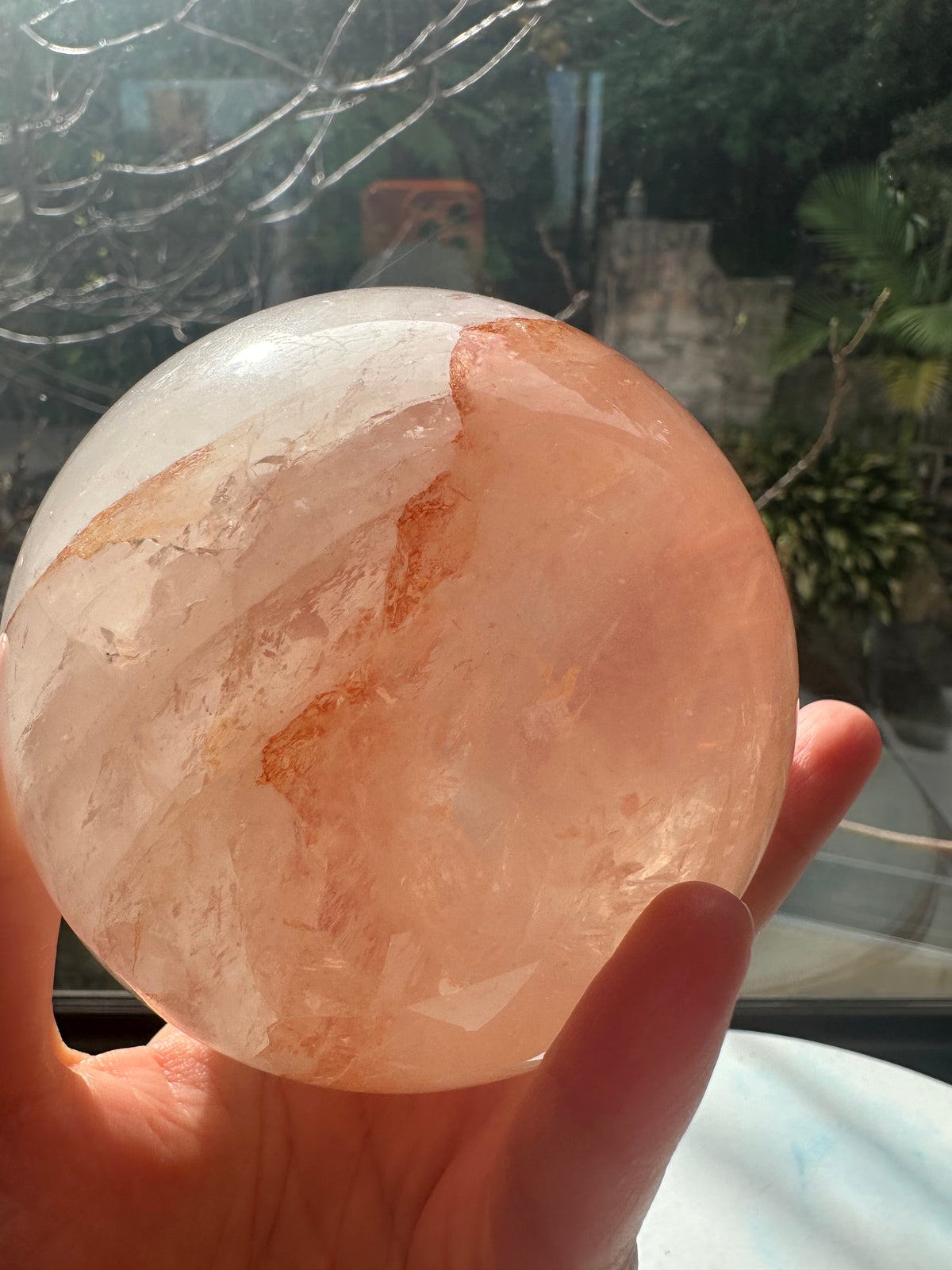 Fire Quartz sphere #1 showing red hematite inclusions and internal quartz veils, alternate view 18