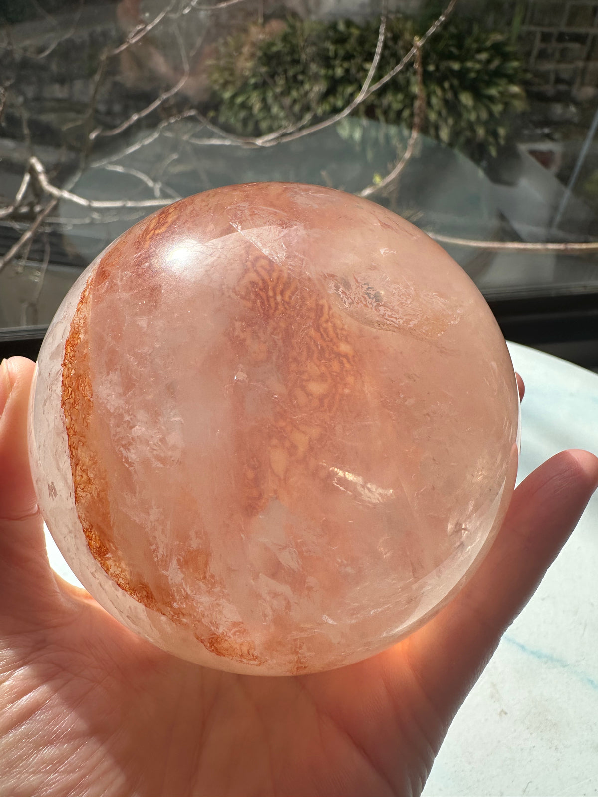 Fire Quartz sphere #1 showing red hematite inclusions and internal quartz veils, alternate view 20