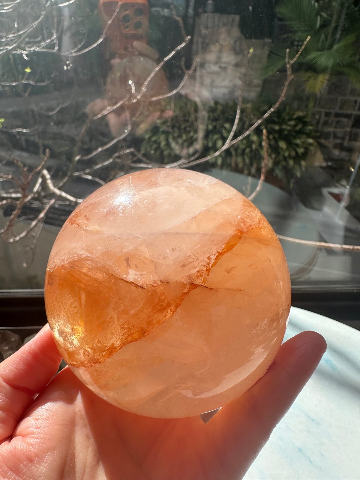 Fire Quartz sphere #2 showing red hematite inclusions and internal quartz veils, alternate view 21