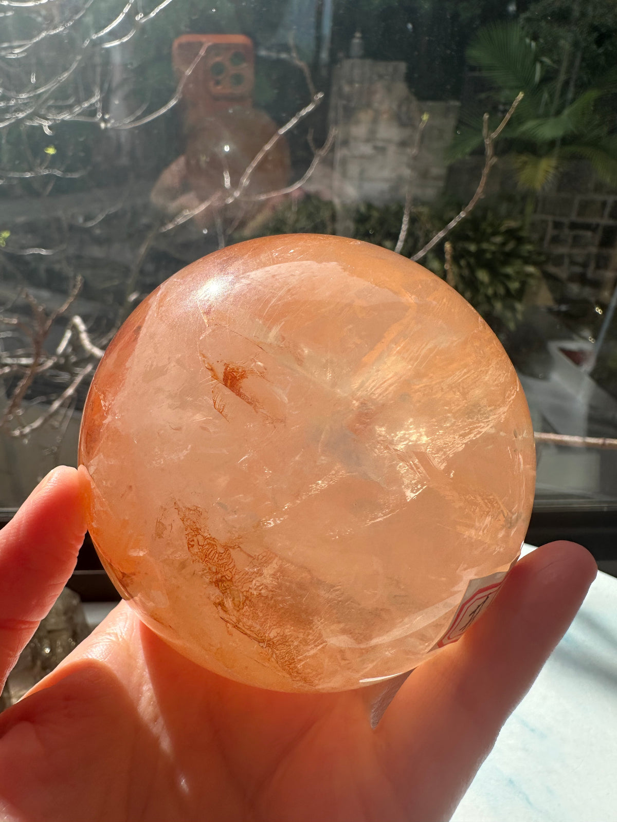 Fire Quartz sphere #2 showing red hematite inclusions and internal quartz veils, alternate view 23
