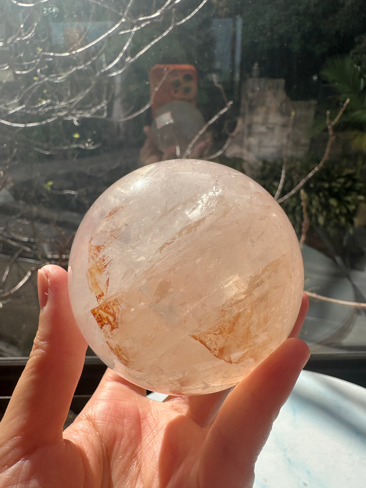 Fire Quartz sphere #3 showing red hematite inclusions and internal quartz veils, alternate view 19
