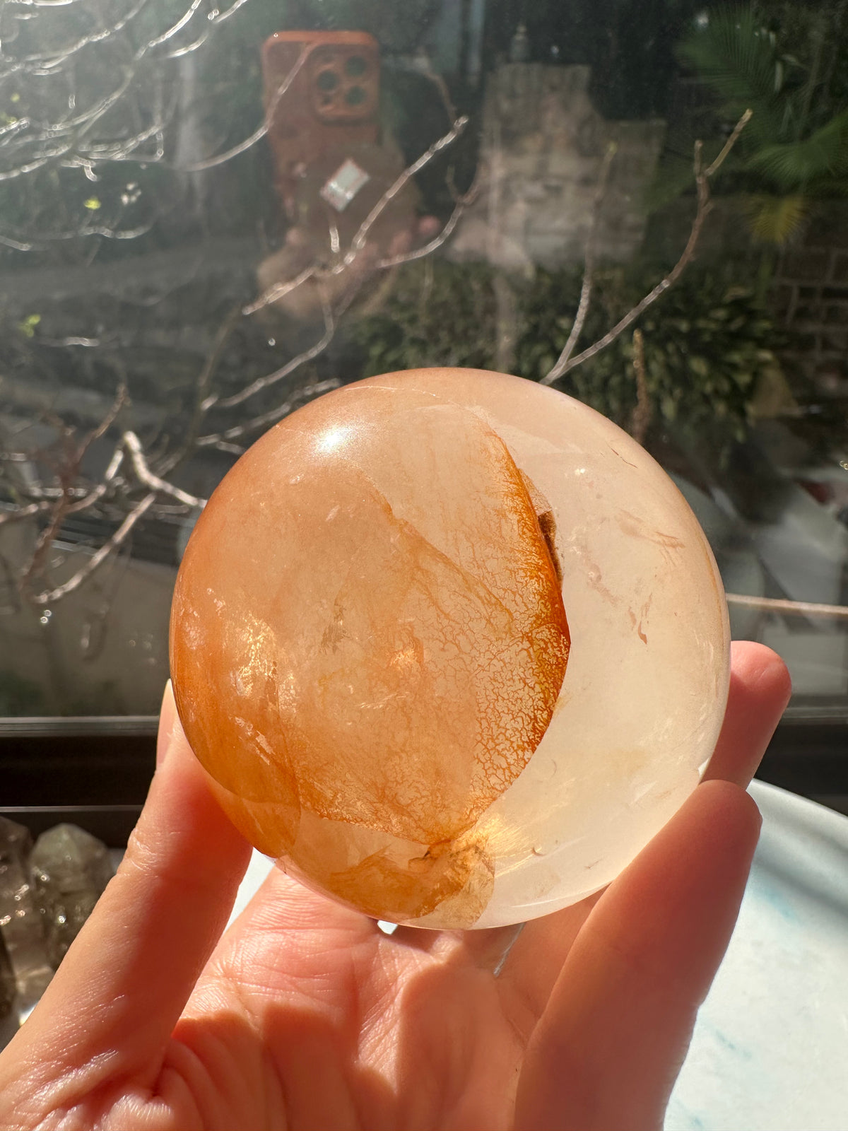 Fire Quartz sphere #4 showing red hematite inclusions and internal quartz veils, alternate view 10
