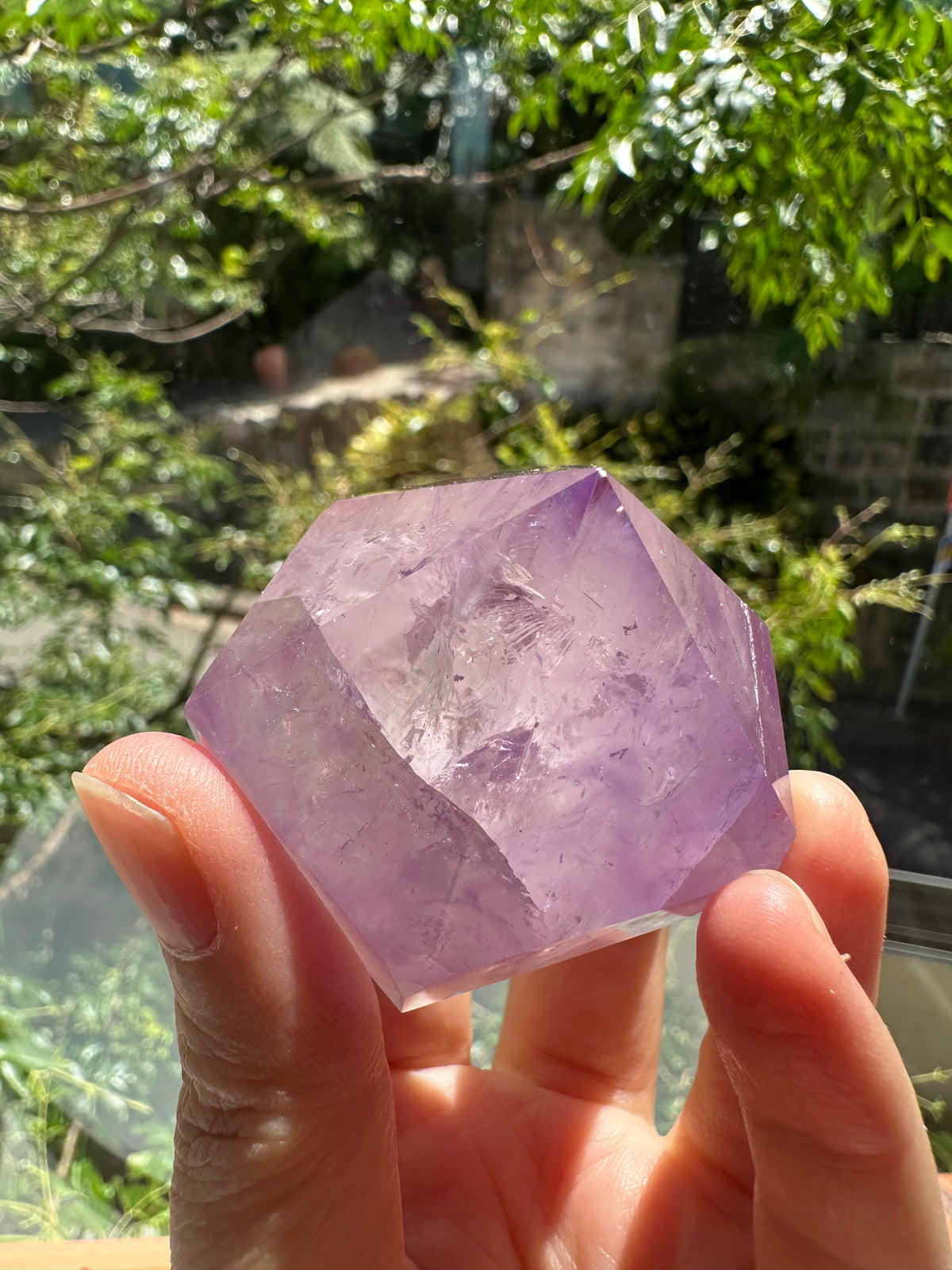 Polished lilac Amethyst diamond top view