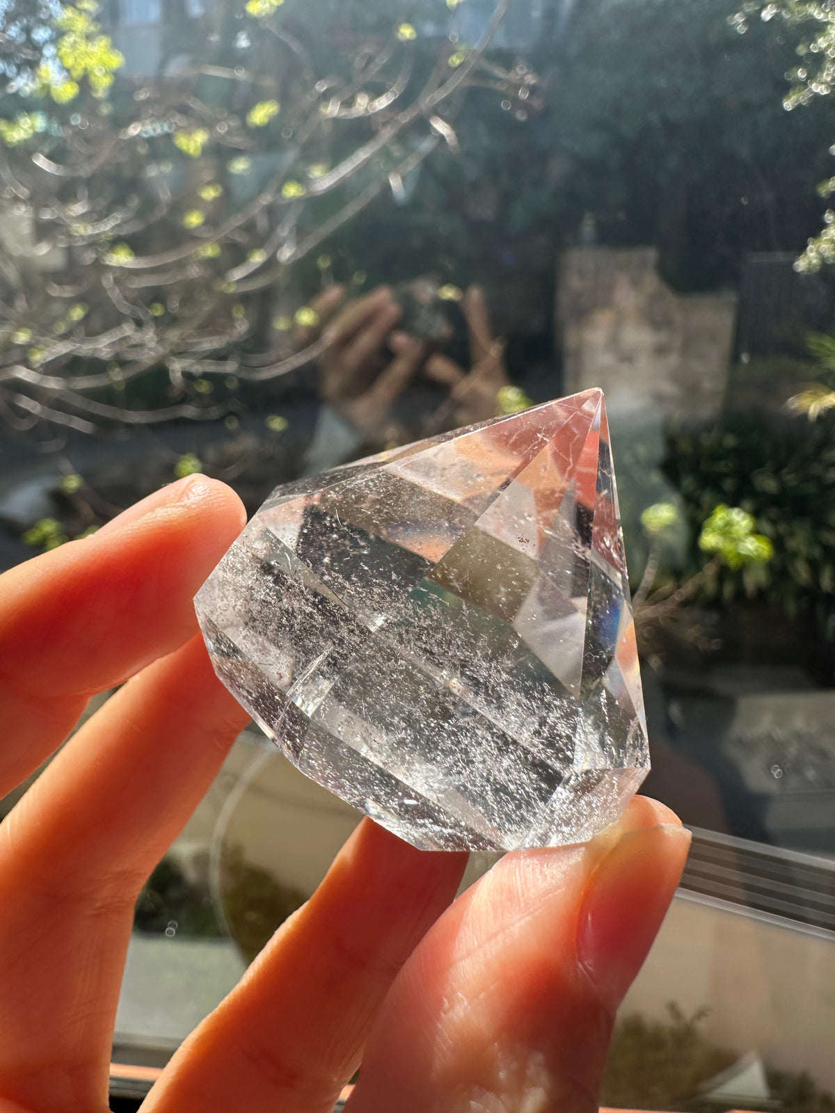 Clear Quartz diamond side view showing polished facets