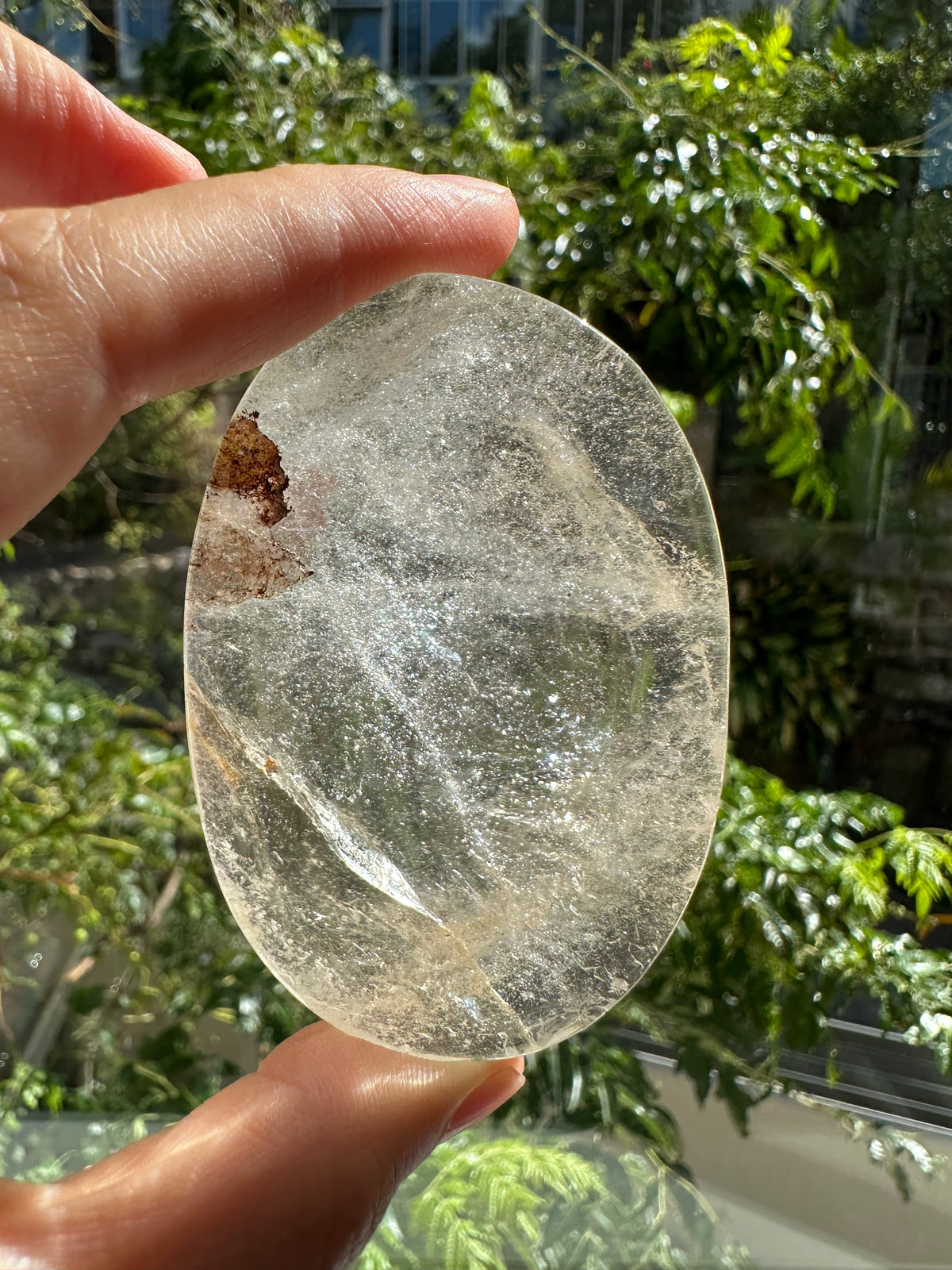 Natural Clear Quartz worry stone side view