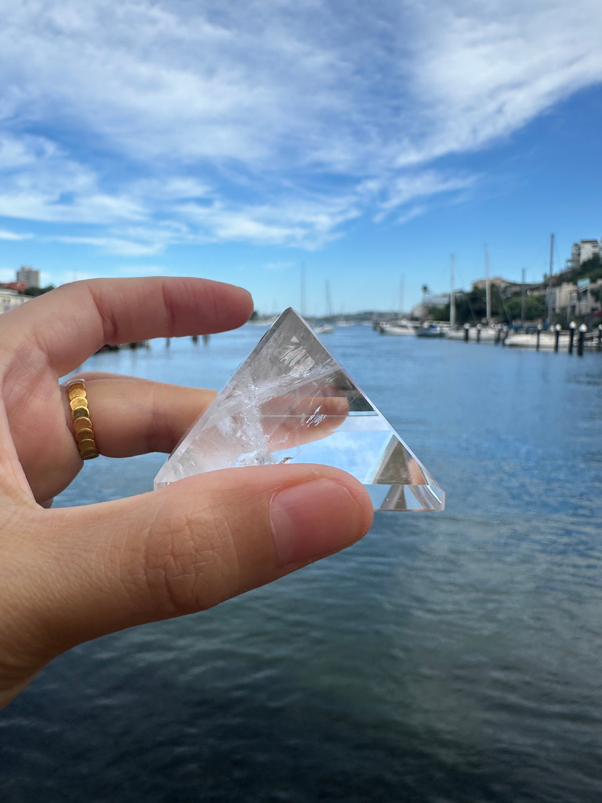 Natural quartz pyramid with internal veils and inclusions