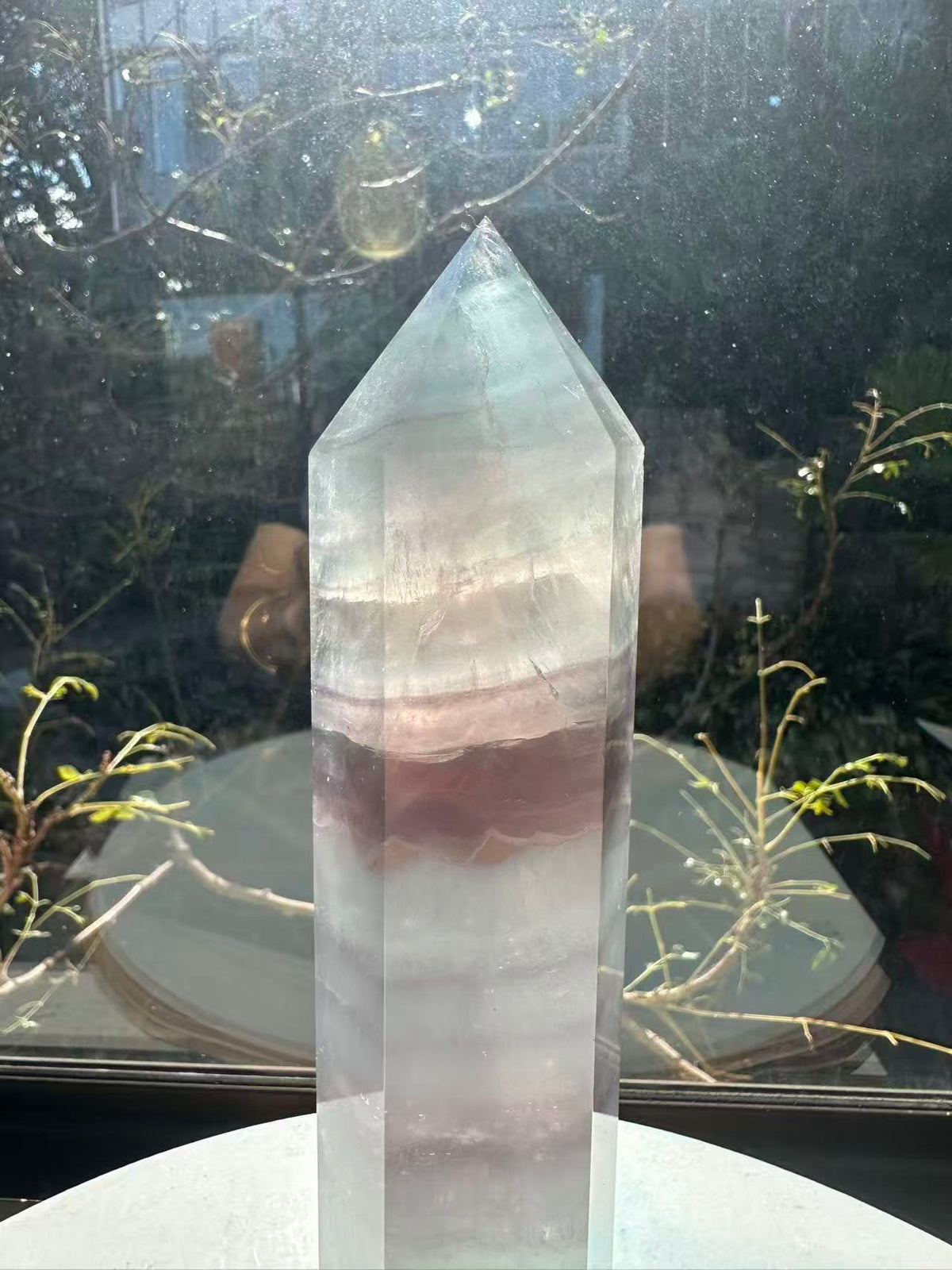  Hand-polished 22cm pale green fluorite pillar with rhythmic growth layers and a serene translucent finish, 1.1kg crystal decor for focused energy.