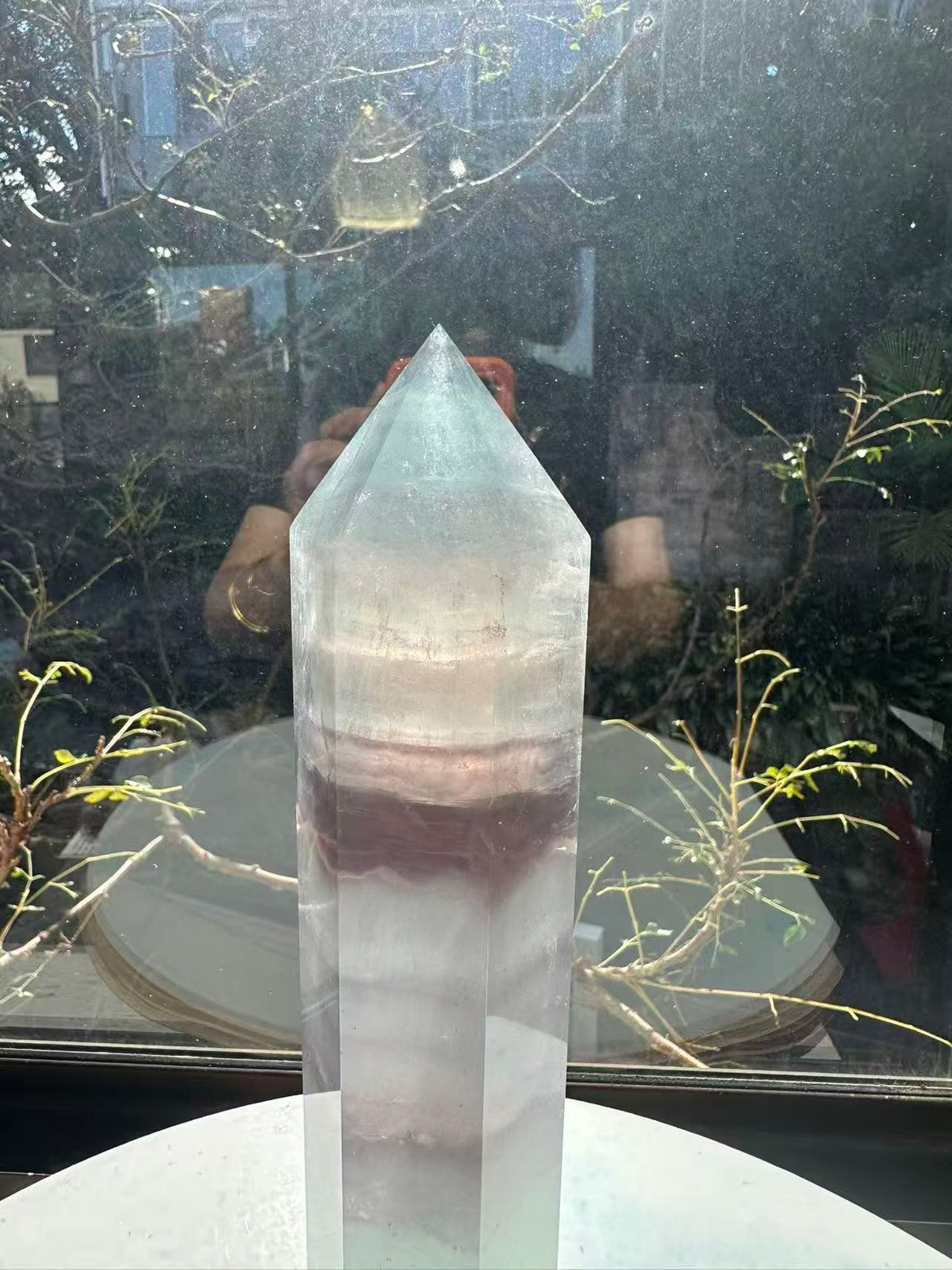  Hand-polished 22cm pale green fluorite pillar with rhythmic growth layers and a serene translucent finish, 1.1kg crystal decor for focused energy.