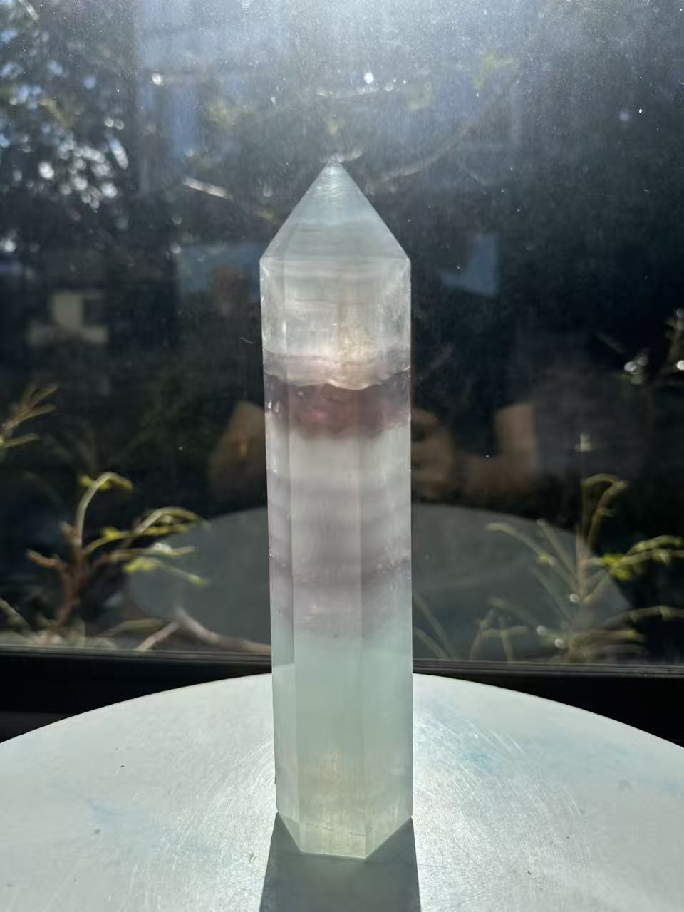 21cm rainbow fluorite tower showing intricate horizontal stripes and phantom structures in light green tones, a unique 0.846kg natural geometric mineral.