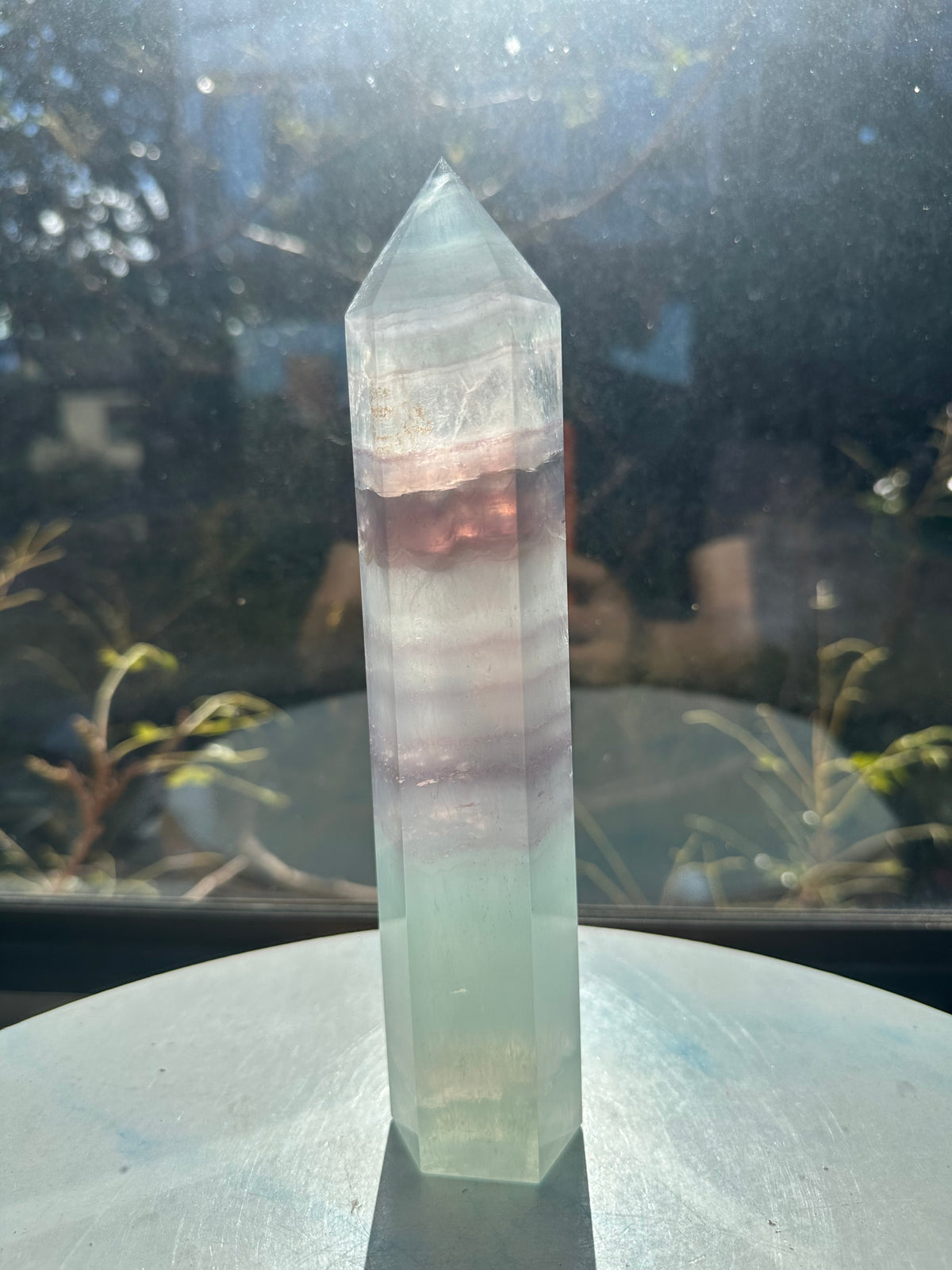 21cm rainbow fluorite tower showing intricate horizontal stripes and phantom structures in light green tones, a unique 0.846kg natural geometric mineral.