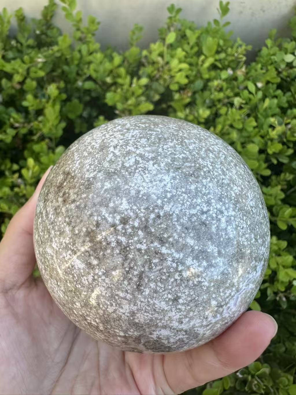 #3,"Large Moss Agate crystal sphere for professional desk decor, 772g, showing deep forest-like moss patterns and sparkling natural druzy by Moon Rituals."