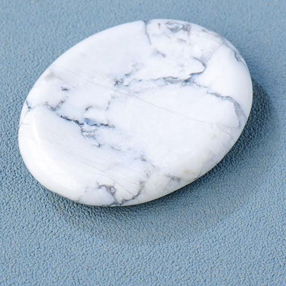 Natural polished thumb stone product example for crystal worry stone collection