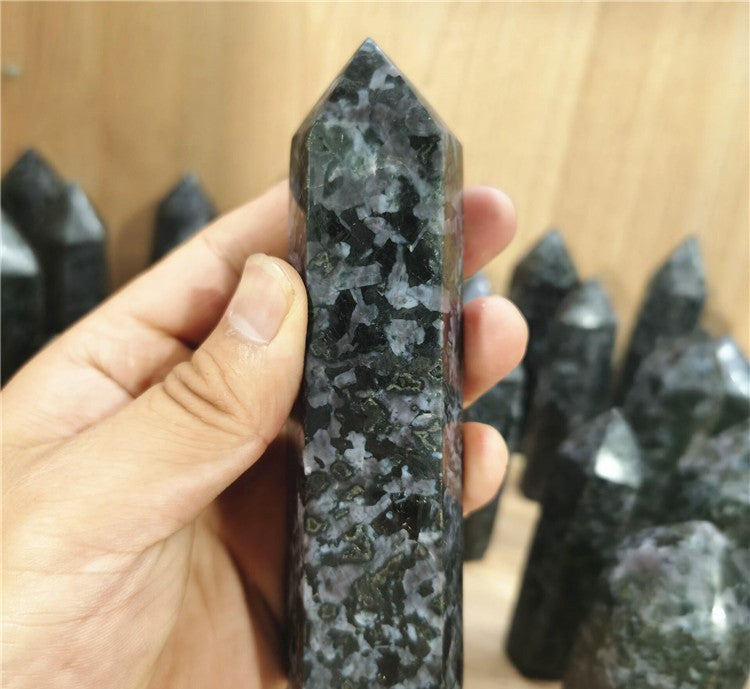 Indigo Gabbro crystal point alternate angle with polished mottled surface