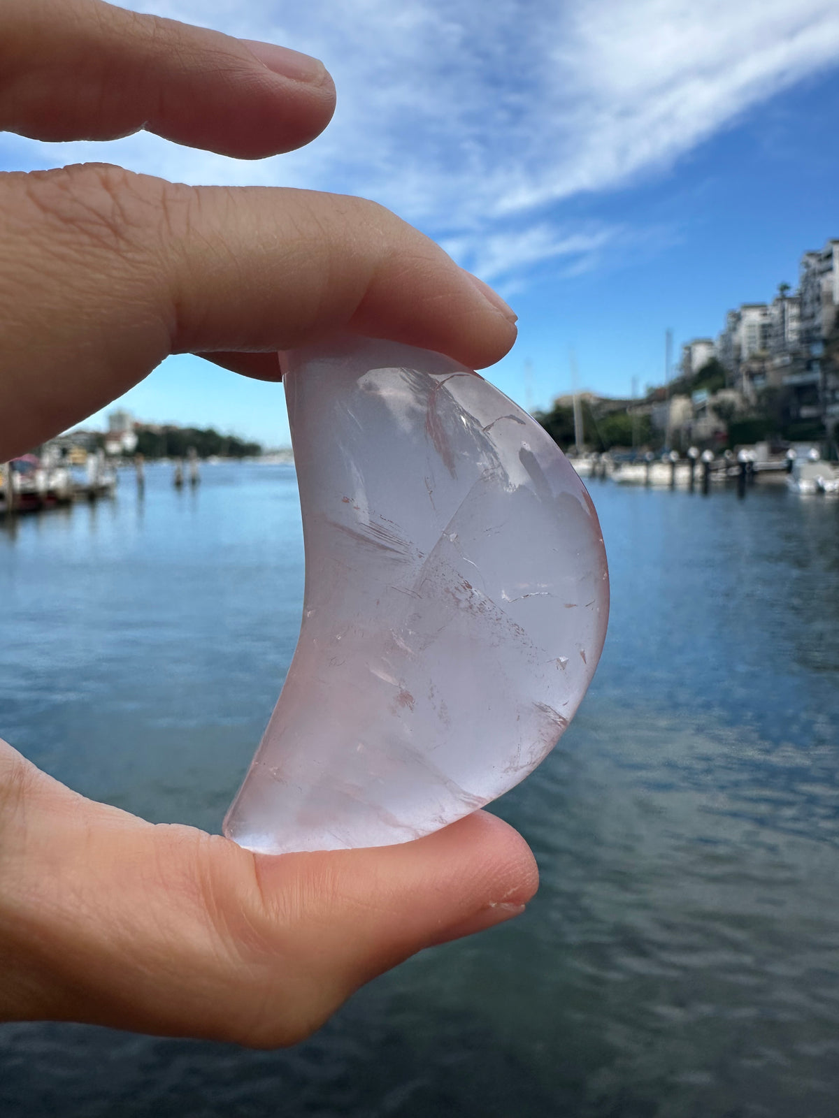 Polished Rose Quartz crescent moon for crystal gift or display