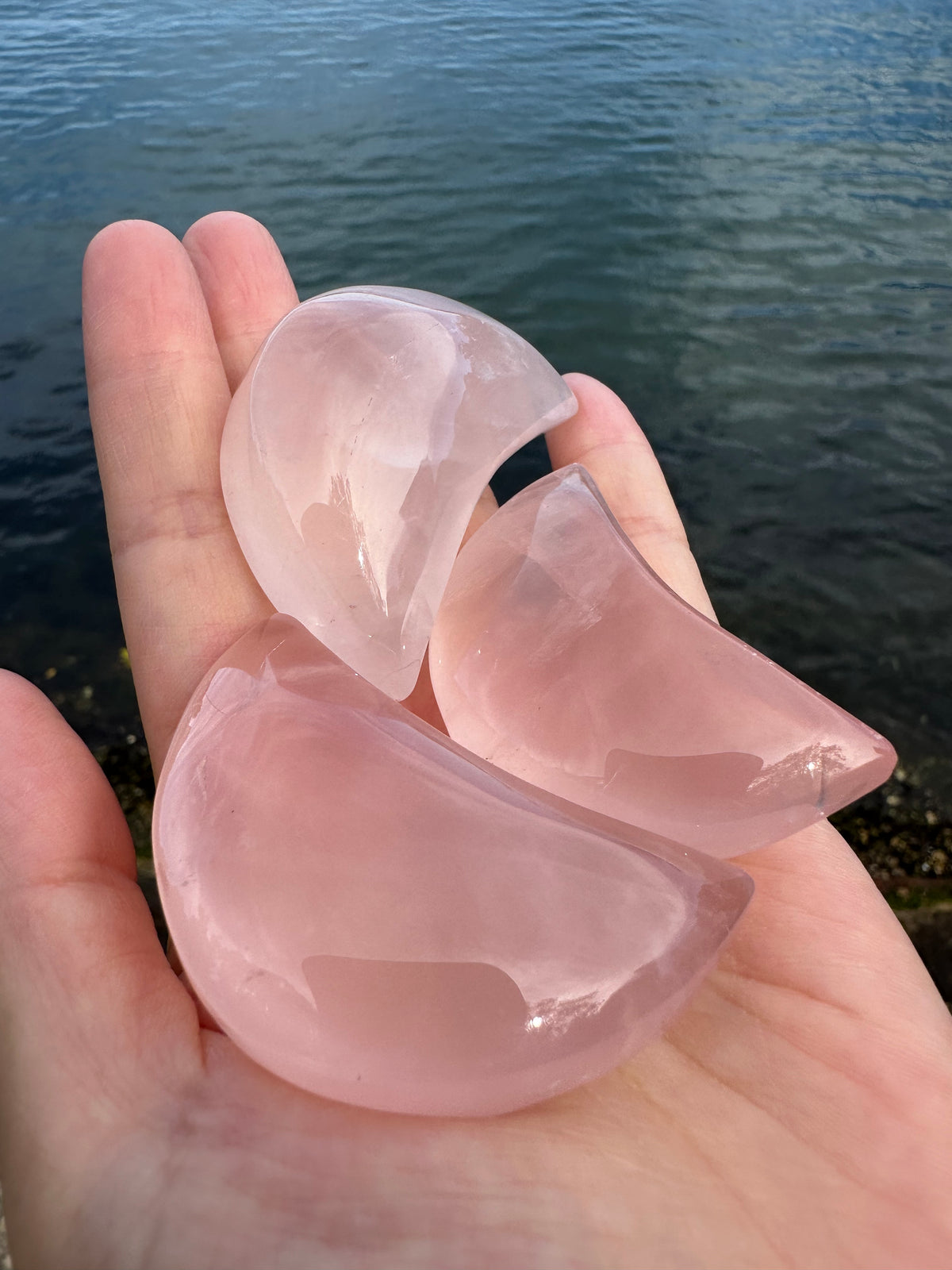 Rose Quartz crescent moon crystal carving close-up