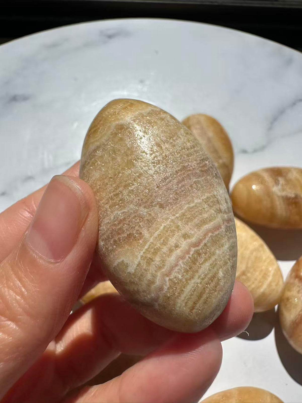 Yellow Calcite crystal palm stone for desk or display