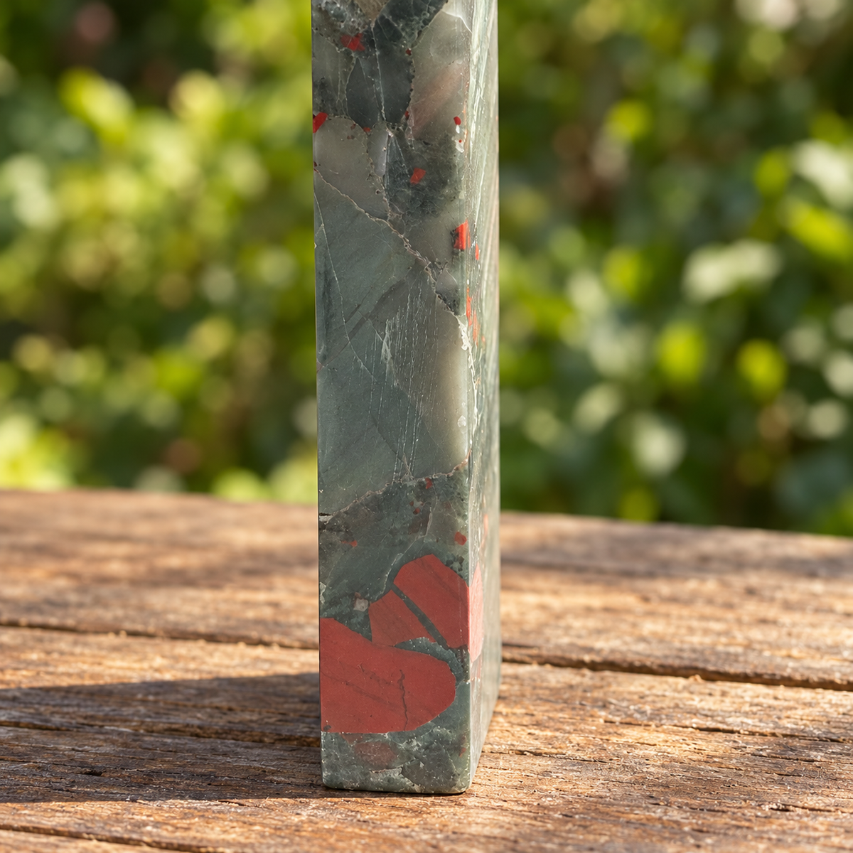 Close-up of No.5 tower lower side showing large brick-red patches, natural veins and fine surface scratches.
