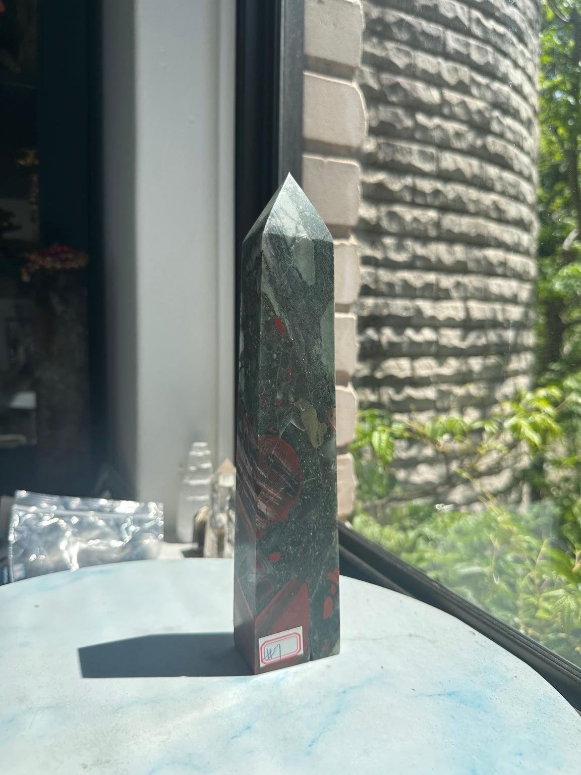 Original full-length front view of exact No.7 tower, showing the 25cm slender pointed form and large red markings below.