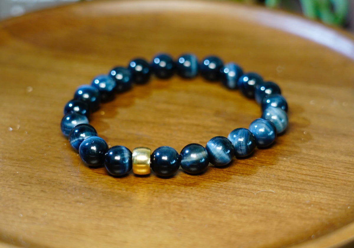 Blue Tiger Eye bracelet alternate angle with dark blue Hawk's Eye beads