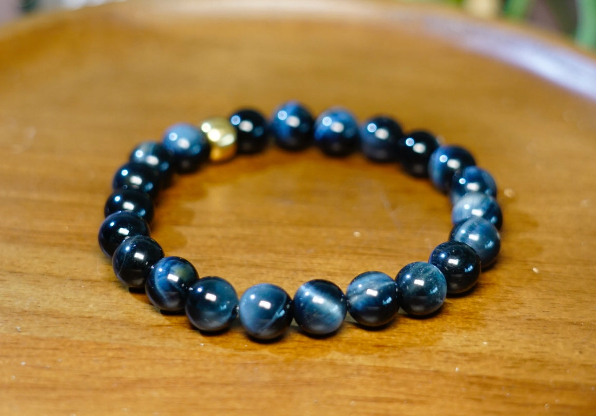 Natural Blue Tiger Eye stretch bracelet showing reflective bead pattern