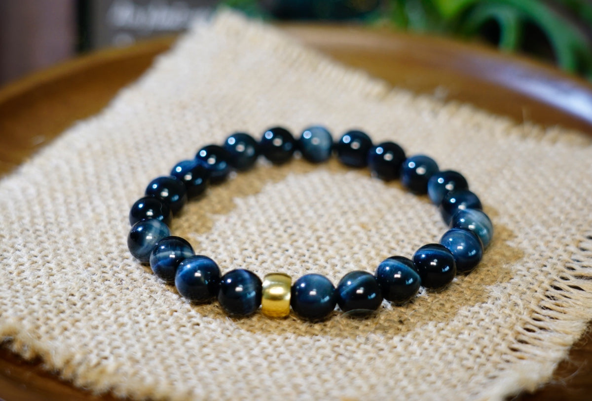 Natural Blue Tiger Eye bracelet showing polished bead lustre