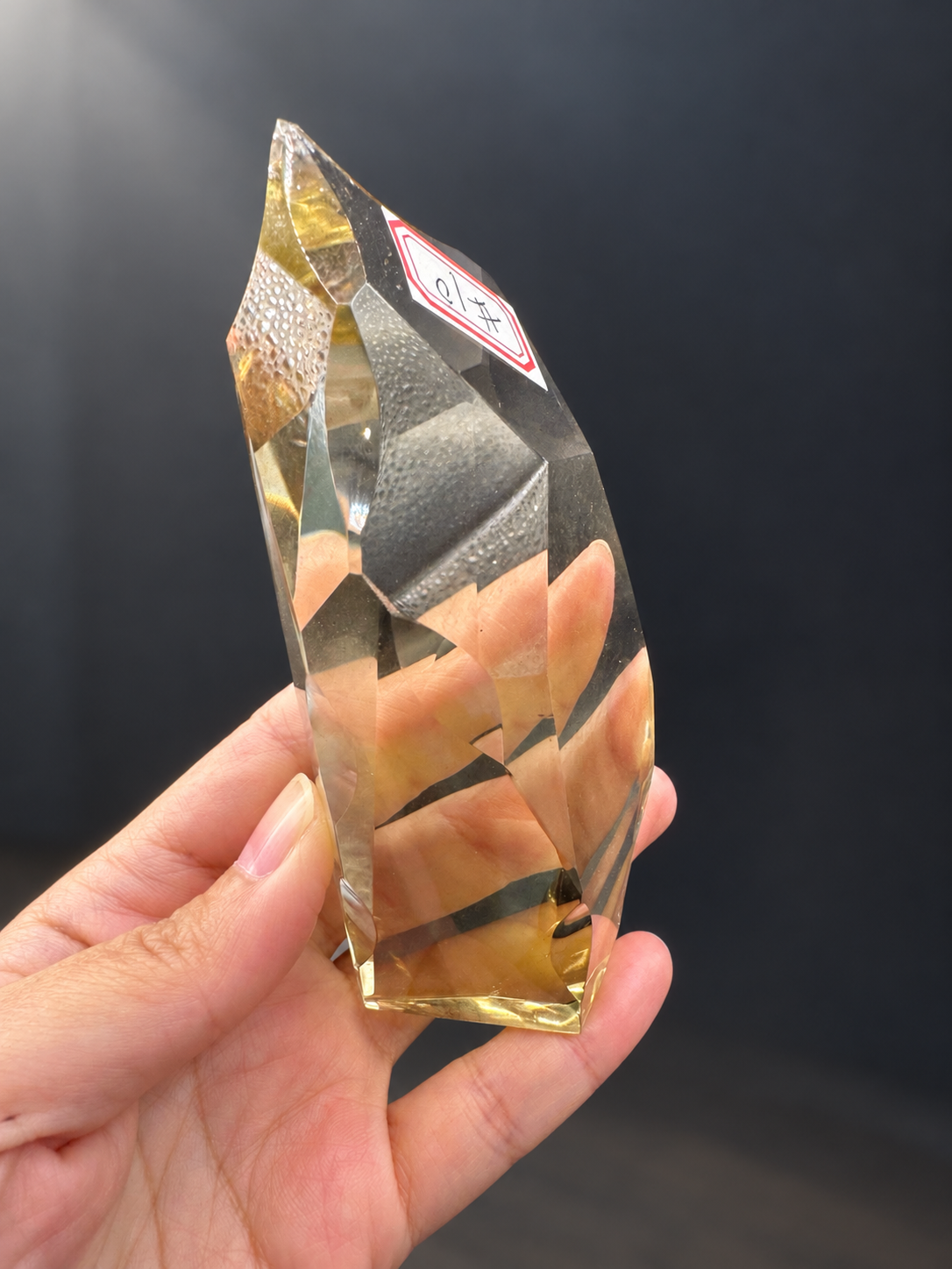 Side profile of Brazilian citrine freeform No.10 with the original number sticker