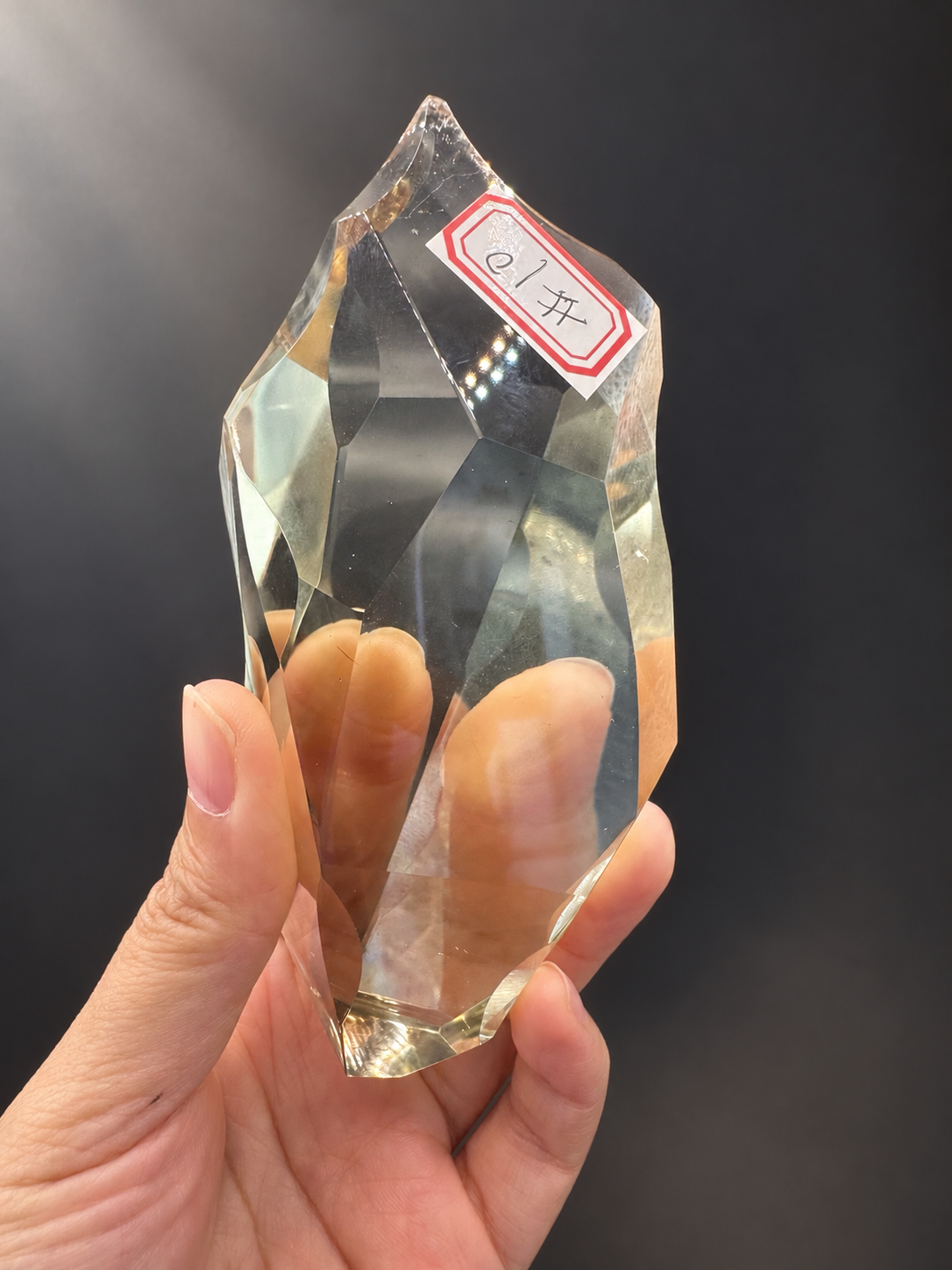 Brazilian citrine No.10 showing clear body, polished facets and original sticker