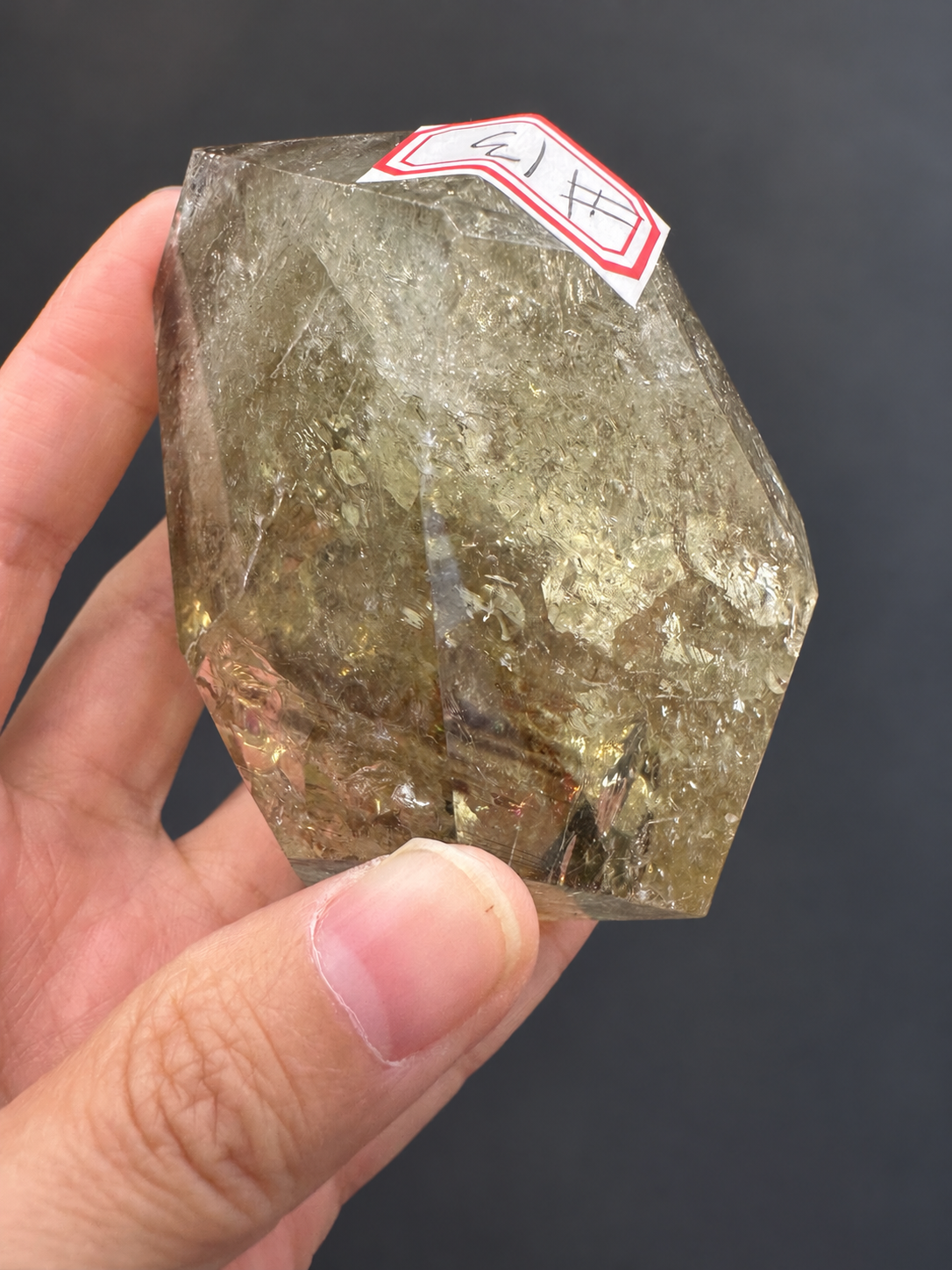 Brazilian citrine freeform No.13, 242g, held in hand — view 2
