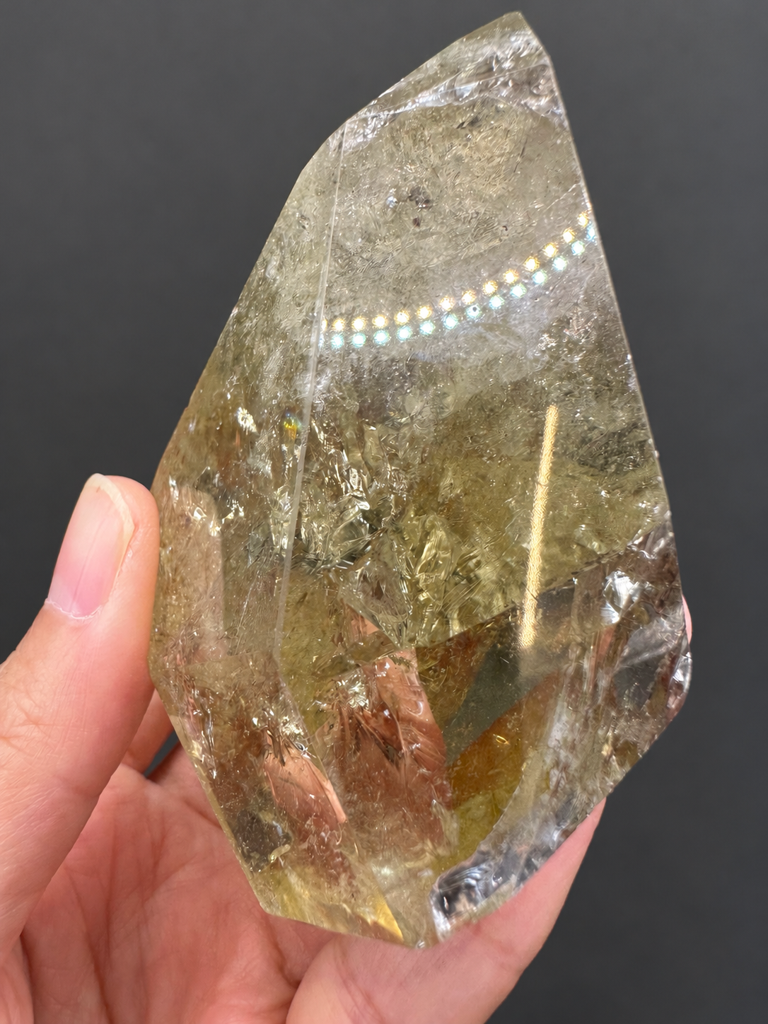 Brazilian citrine freeform No.13, 242g, held in hand — view 10