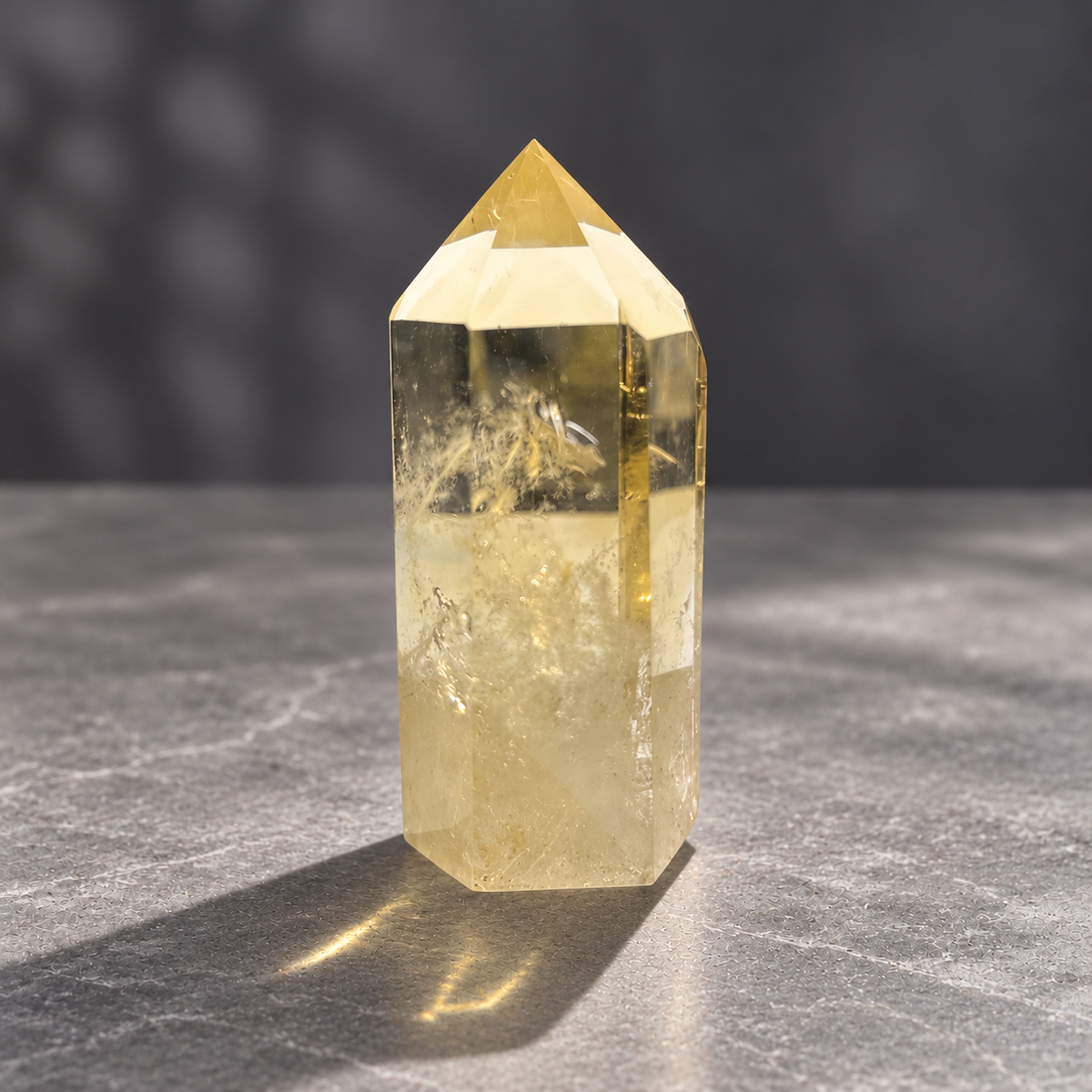 Brazilian citrine tower #4, 158g, champagne-yellow polished point with a clear upper window and feather-like internal veils