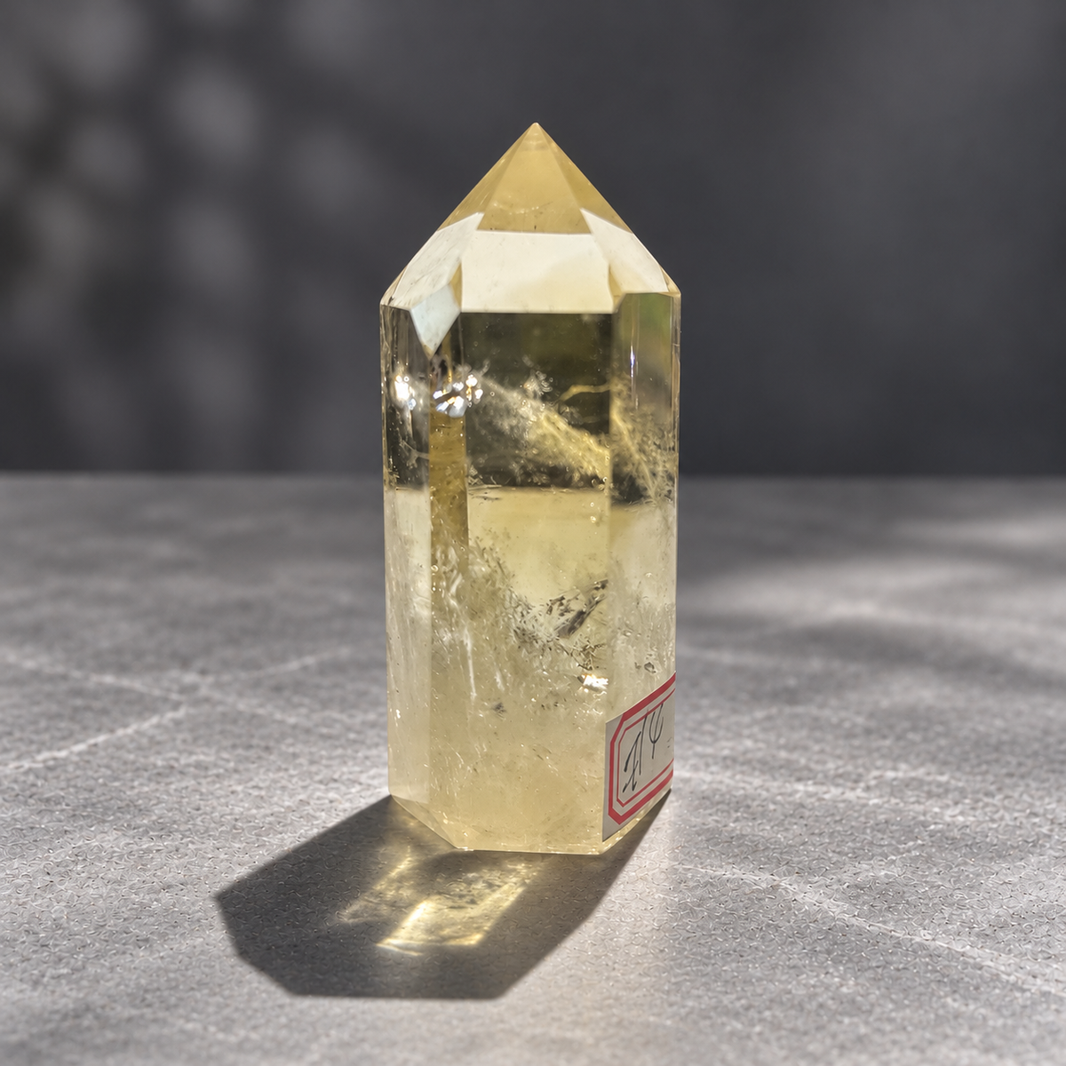 Brazilian citrine tower #4 with a transparent upper window and reflective natural internal textures