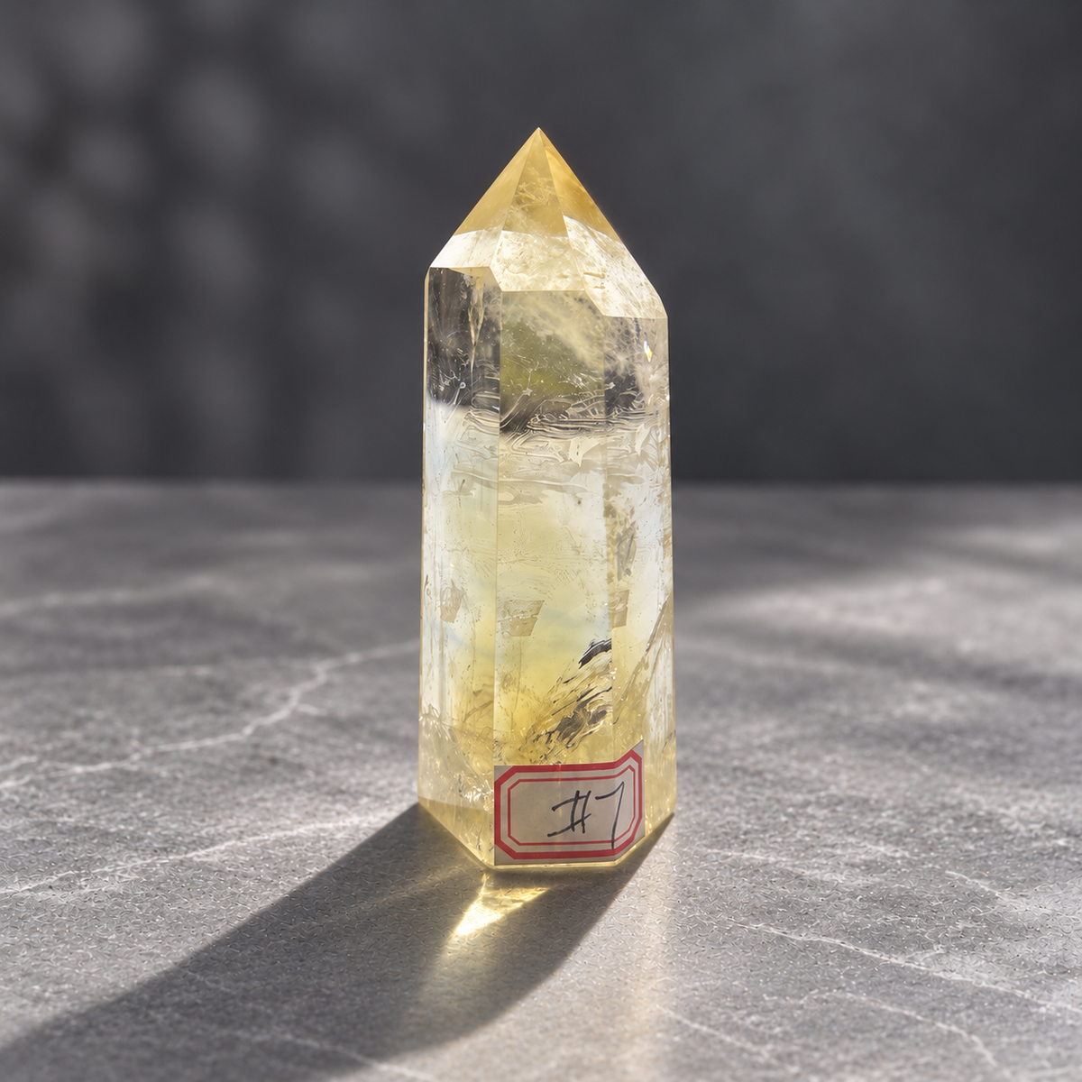 Alternate front of Brazilian citrine tower #7 with wavy internal veils and number 7 label