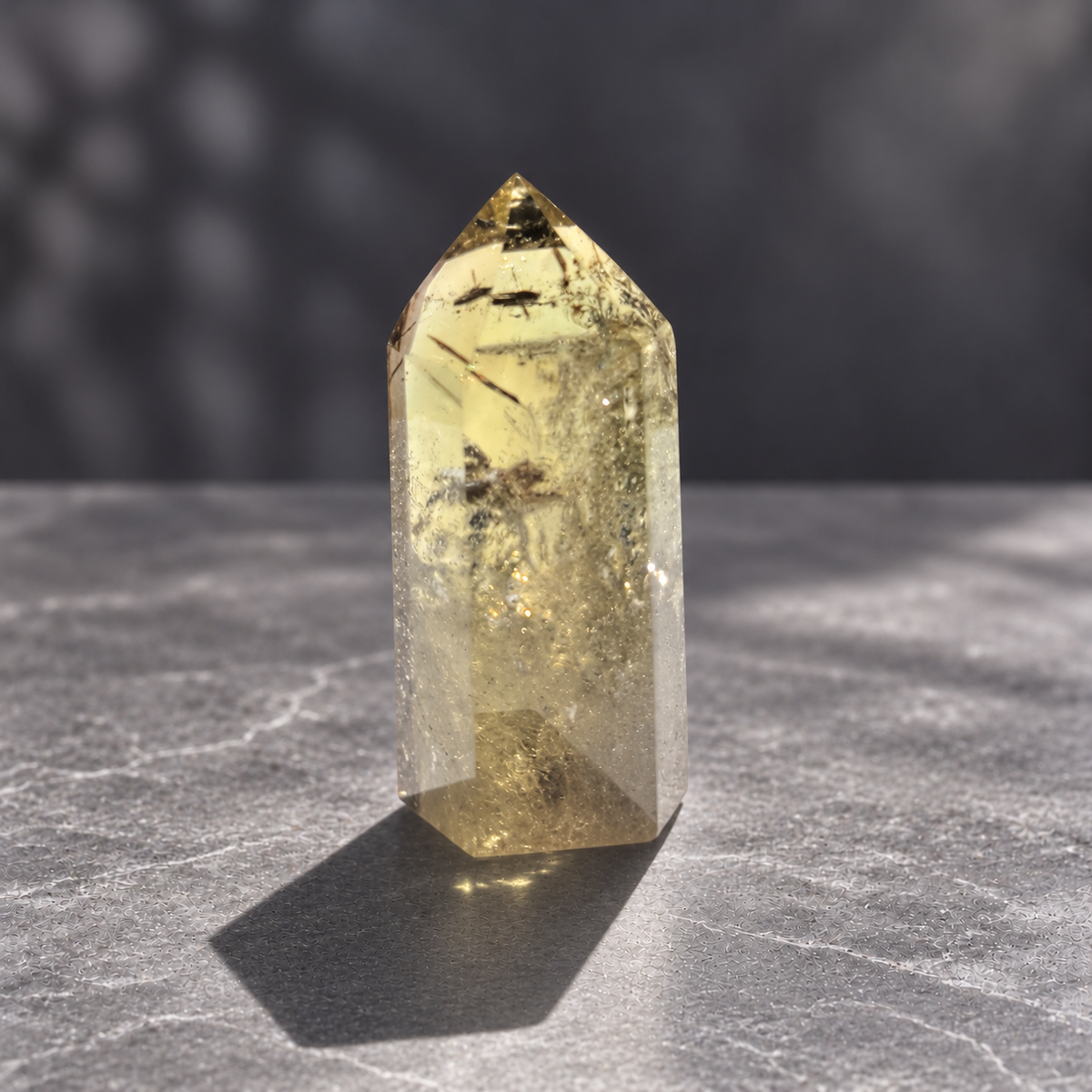 Brazilian pale yellow champagne citrine tower #8, 164g. Reverse view showing clear upper window and textured internal veils