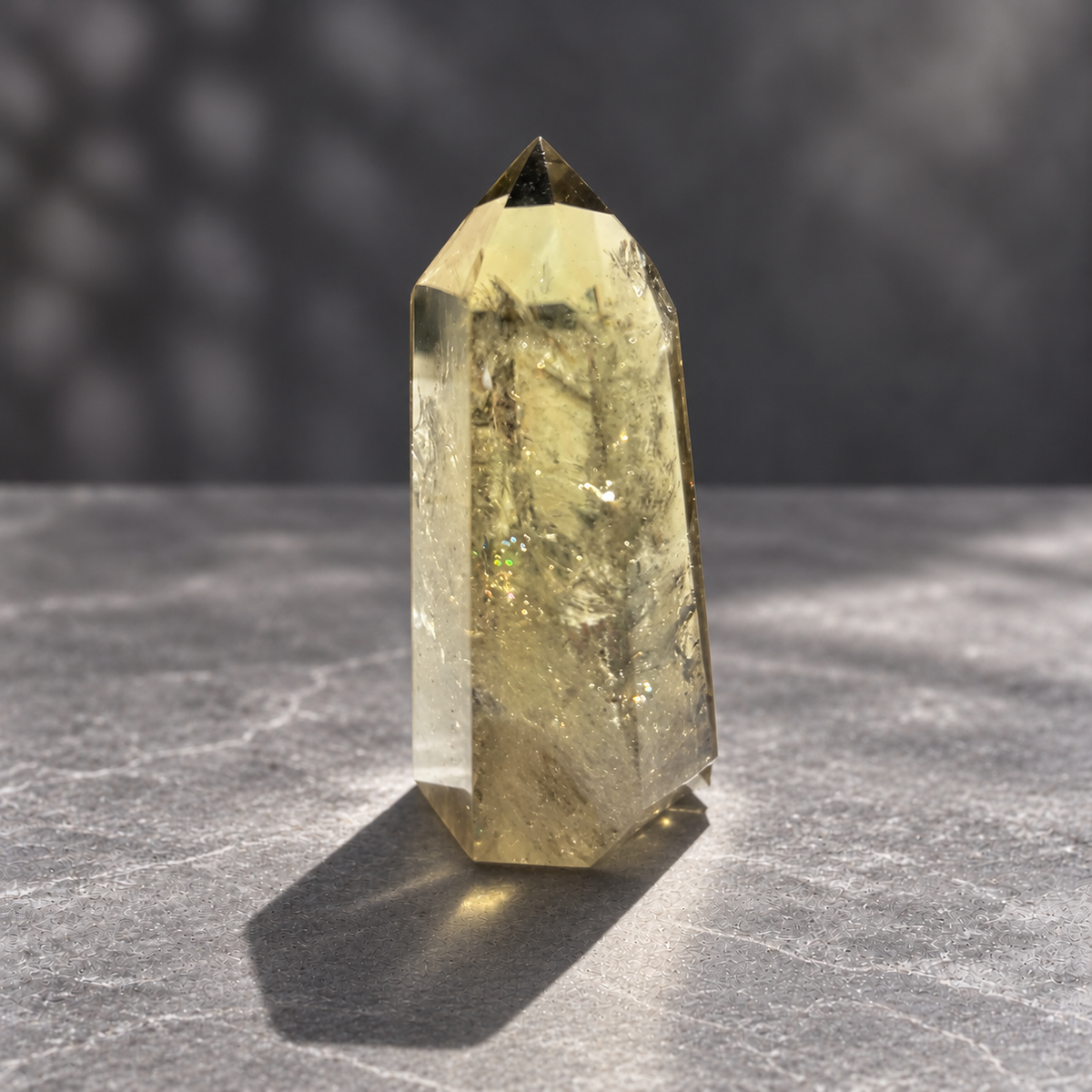 Brazilian pale yellow champagne citrine tower #8, 164g. Opposite side with small rainbow flashes visible within the natural fractures