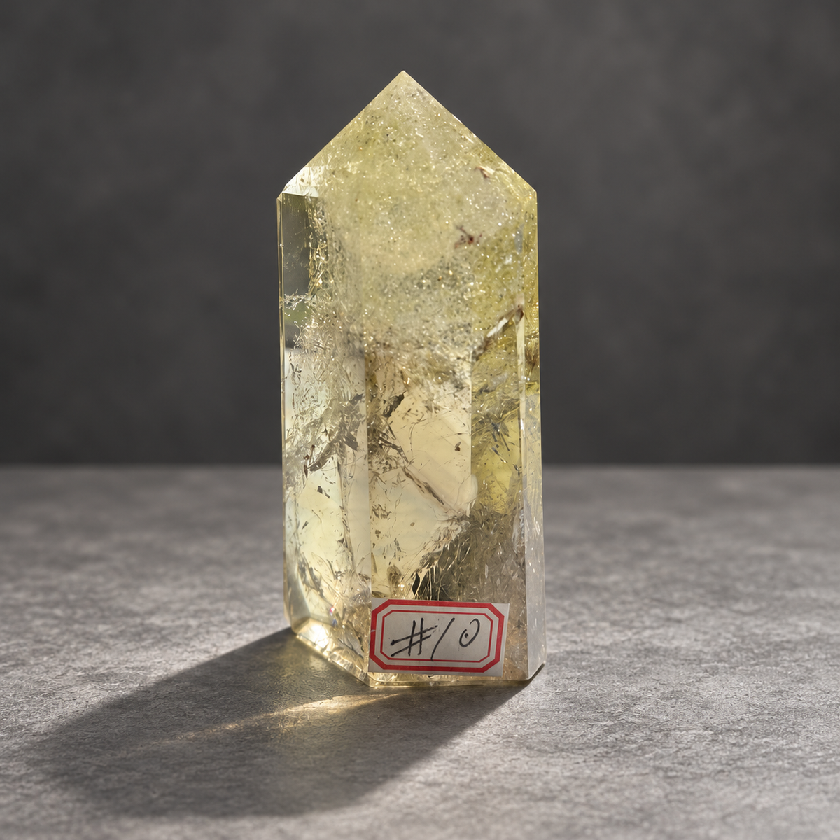 Brazilian citrine tower #10, pale yellow champagne polished quartz point, 207g. Angle 2 showing natural fractures, veils and varied clarity. Exact piece photographed.
