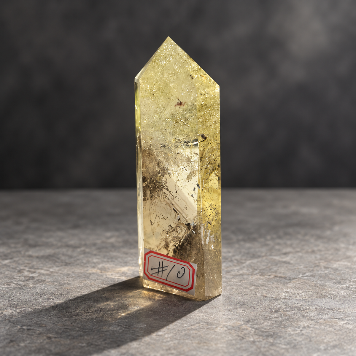 Brazilian citrine tower #10, pale yellow champagne polished quartz point, 207g. Angle 3 showing natural fractures, veils and varied clarity. Exact piece photographed.