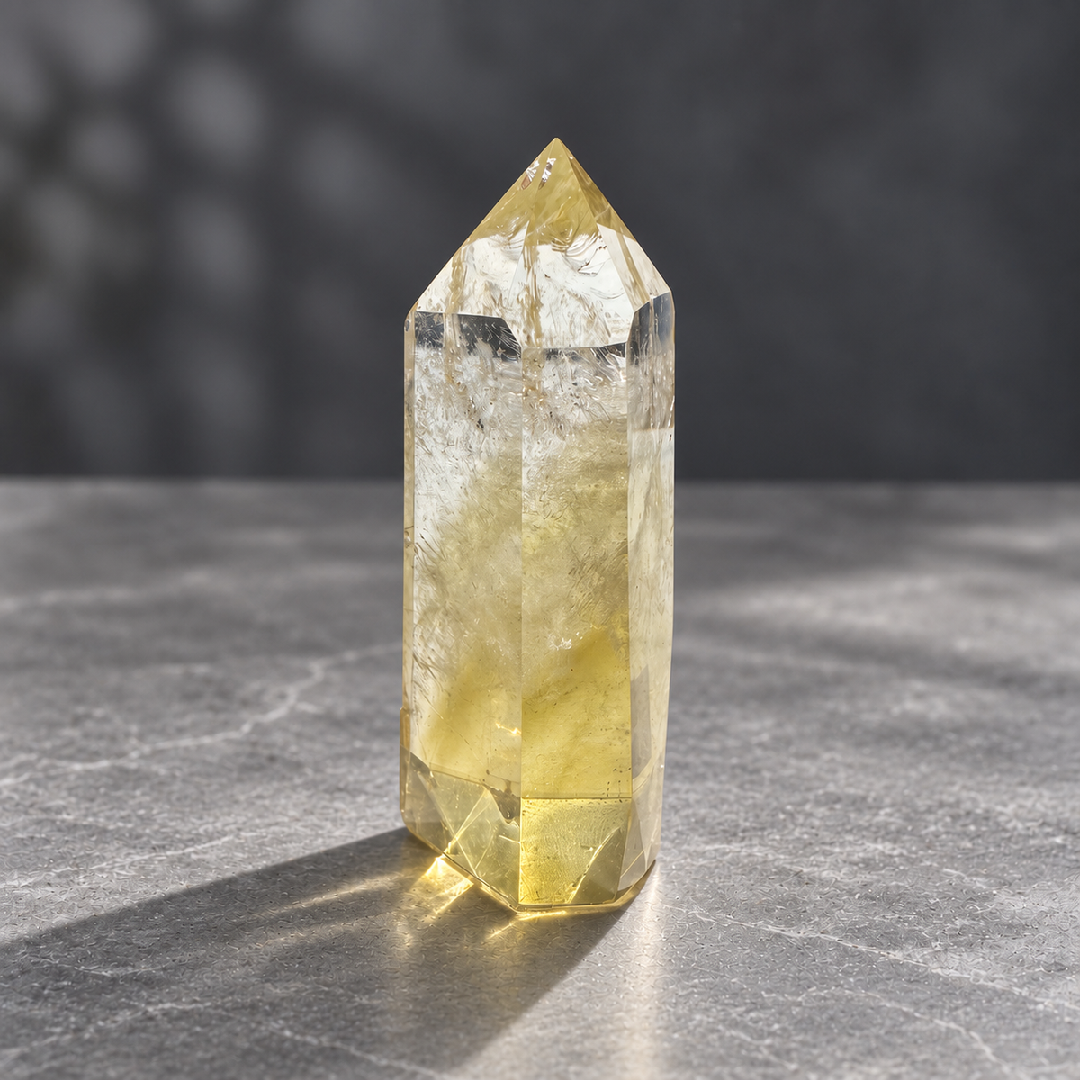 Brazilian citrine tower #2, 151g, main view of a pale champagne-gold polished point with clear areas and natural internal veils