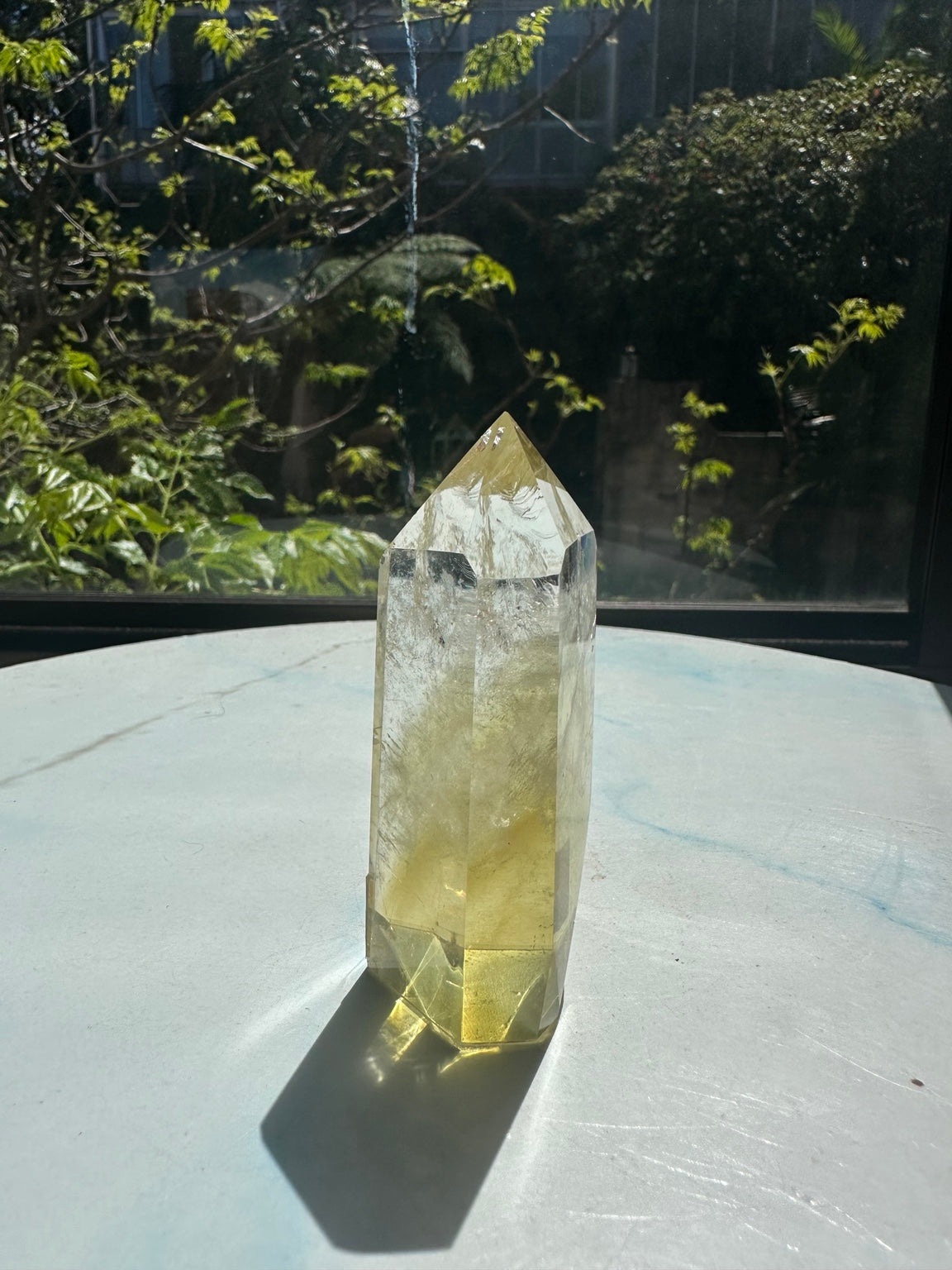 Original natural-sunlight photograph of exact Brazilian citrine tower #2, showing its colour, clear windows and internal veils