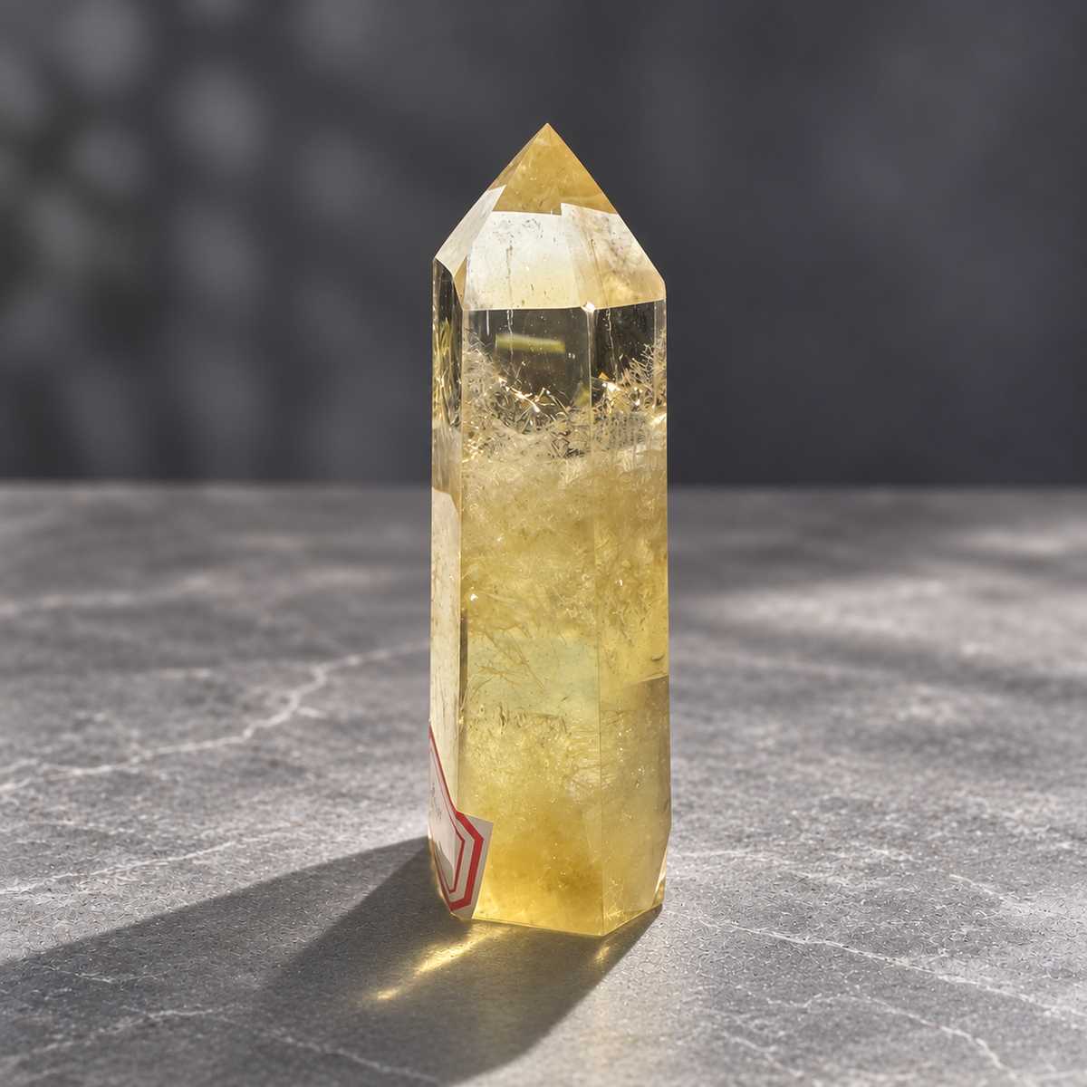 Brazilian citrine tower #5, side view of clear upper windows and feathery interior textures