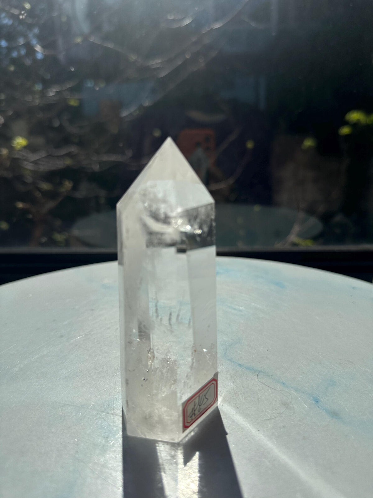 267g Brazilian clear quartz tower, angled side view, exact piece #45