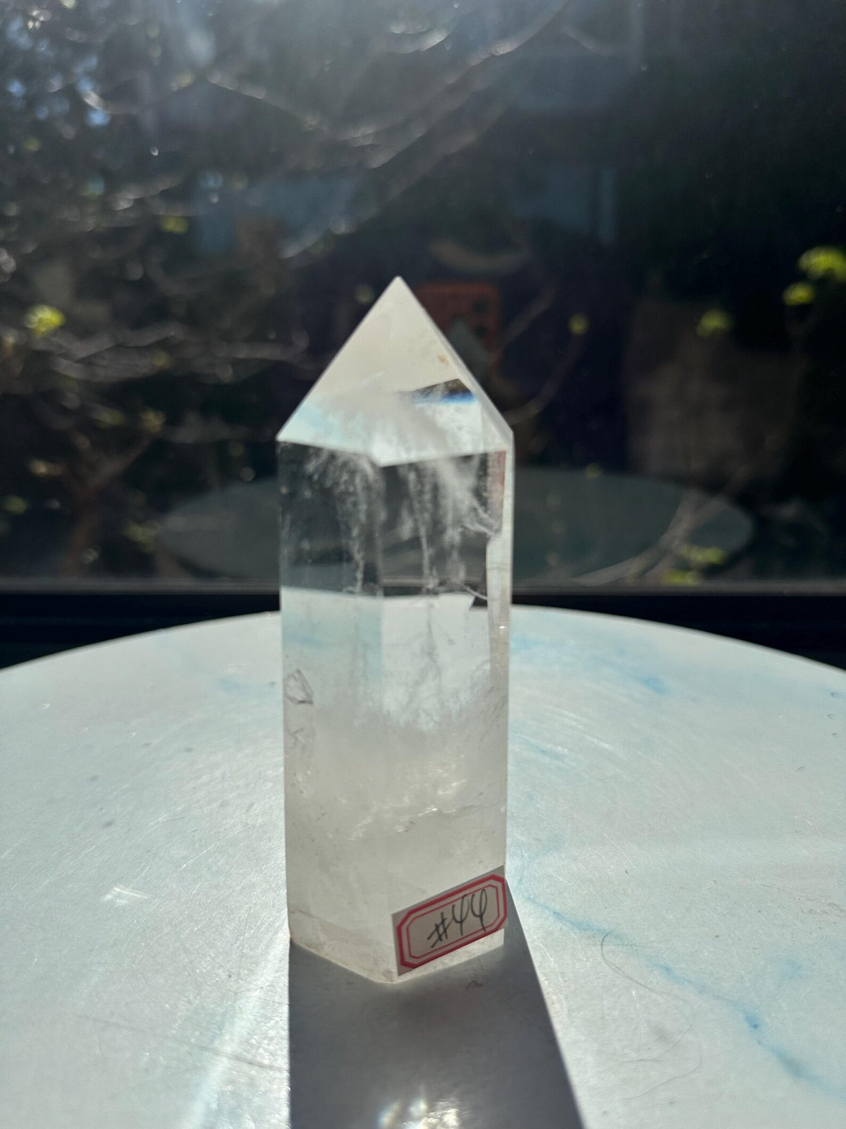 346g Brazilian clear quartz tower, close-up of the polished point, exact piece #44