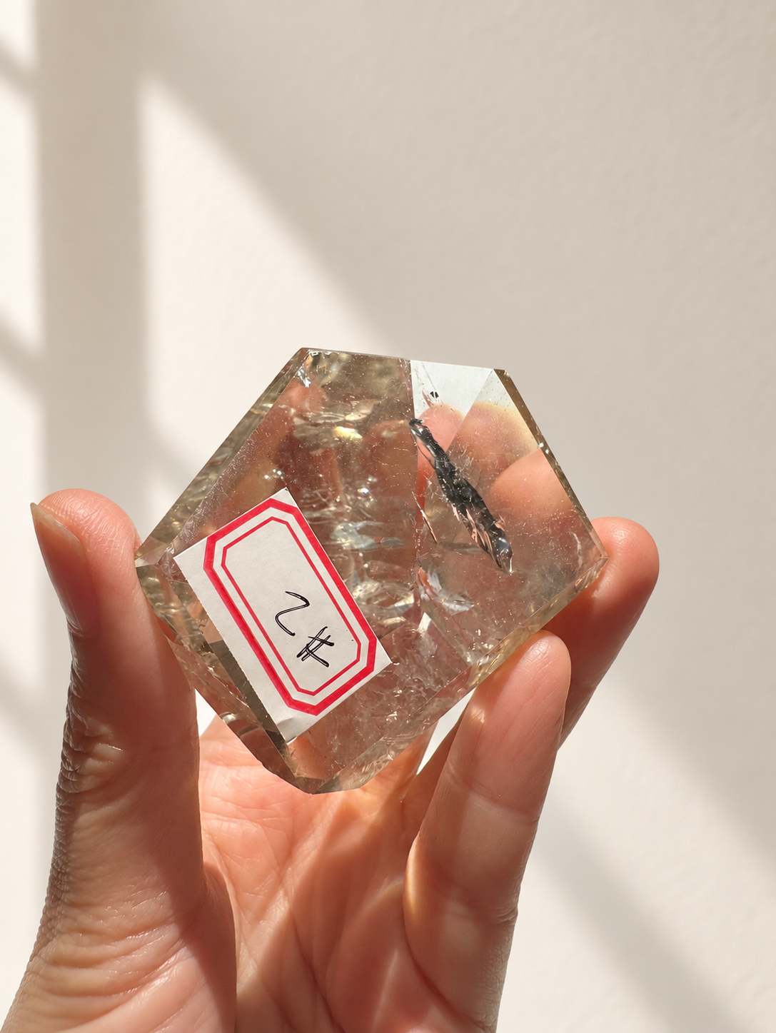 Natural Brazilian citrine 106g exact piece #2 view 6 in soft natural daylight against warm ivory wall
