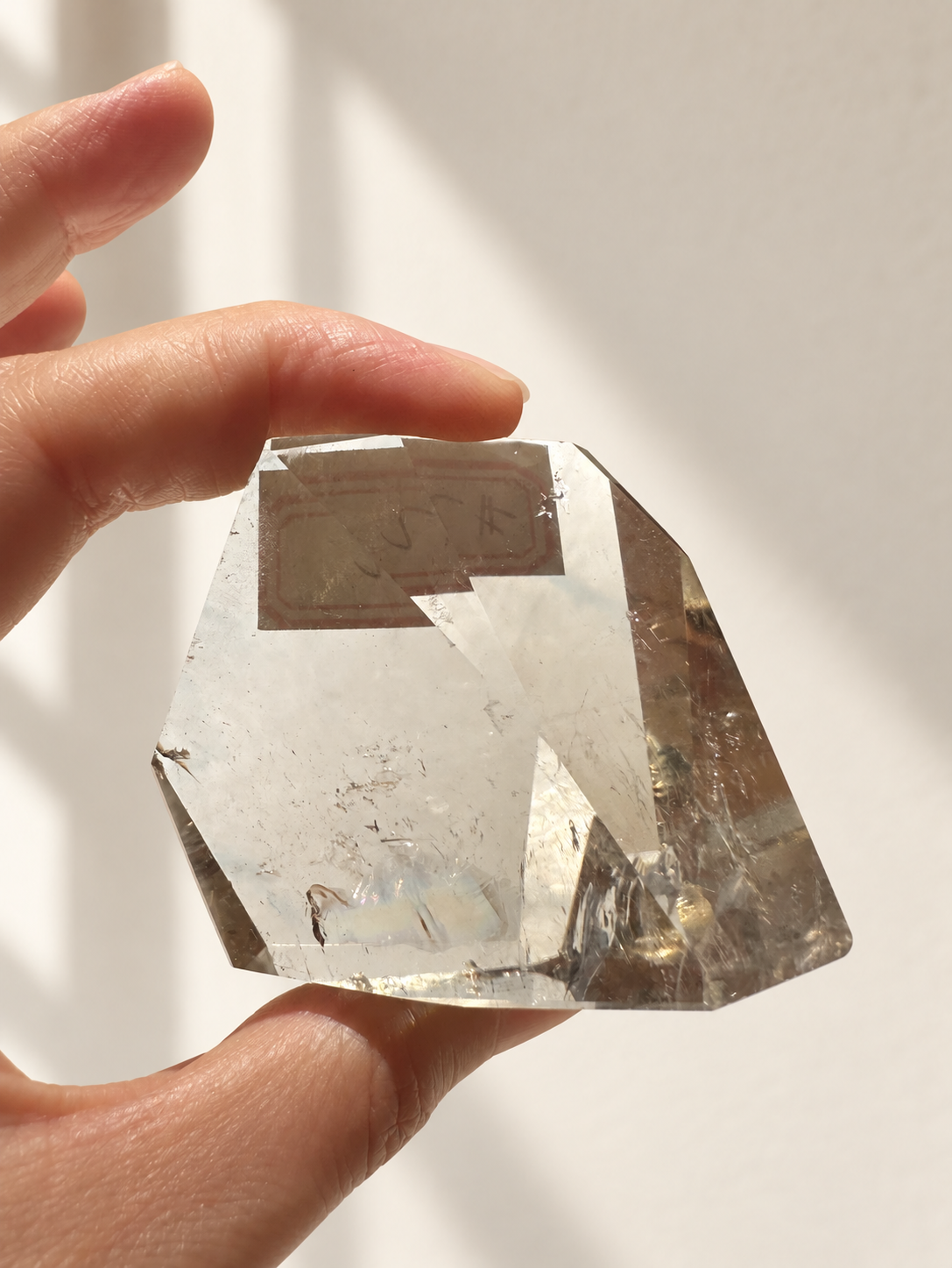 Natural Brazilian citrine 106g exact piece #2 view 7 in soft natural daylight against warm ivory wall